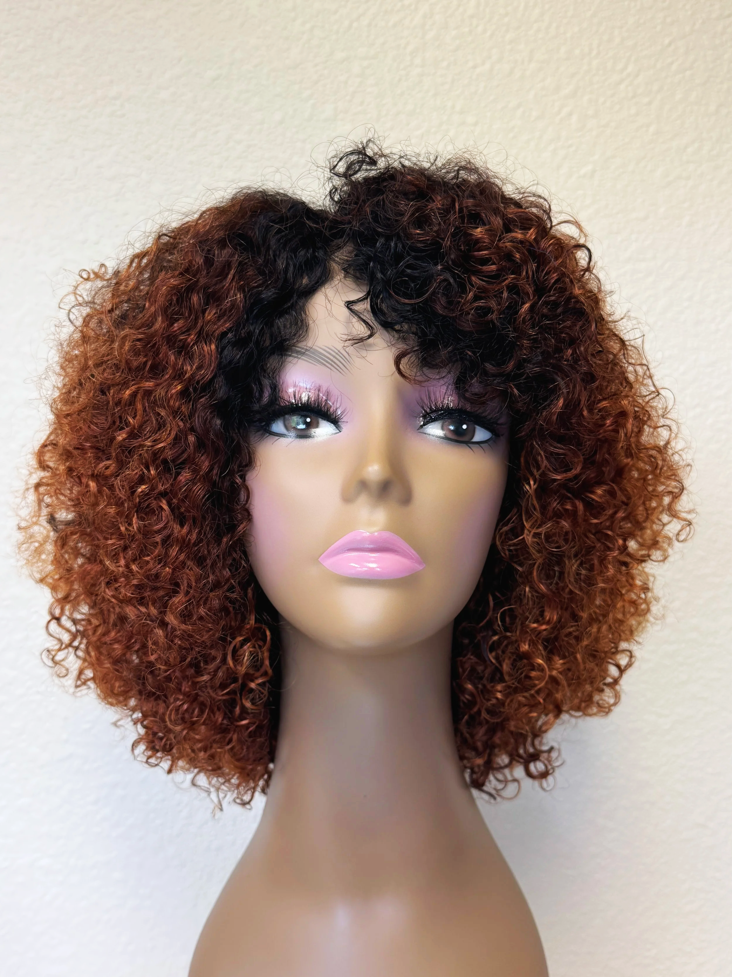 Front view of an extra-full Burmese curly full wig in custom 1B/30 ombré fall shade..png