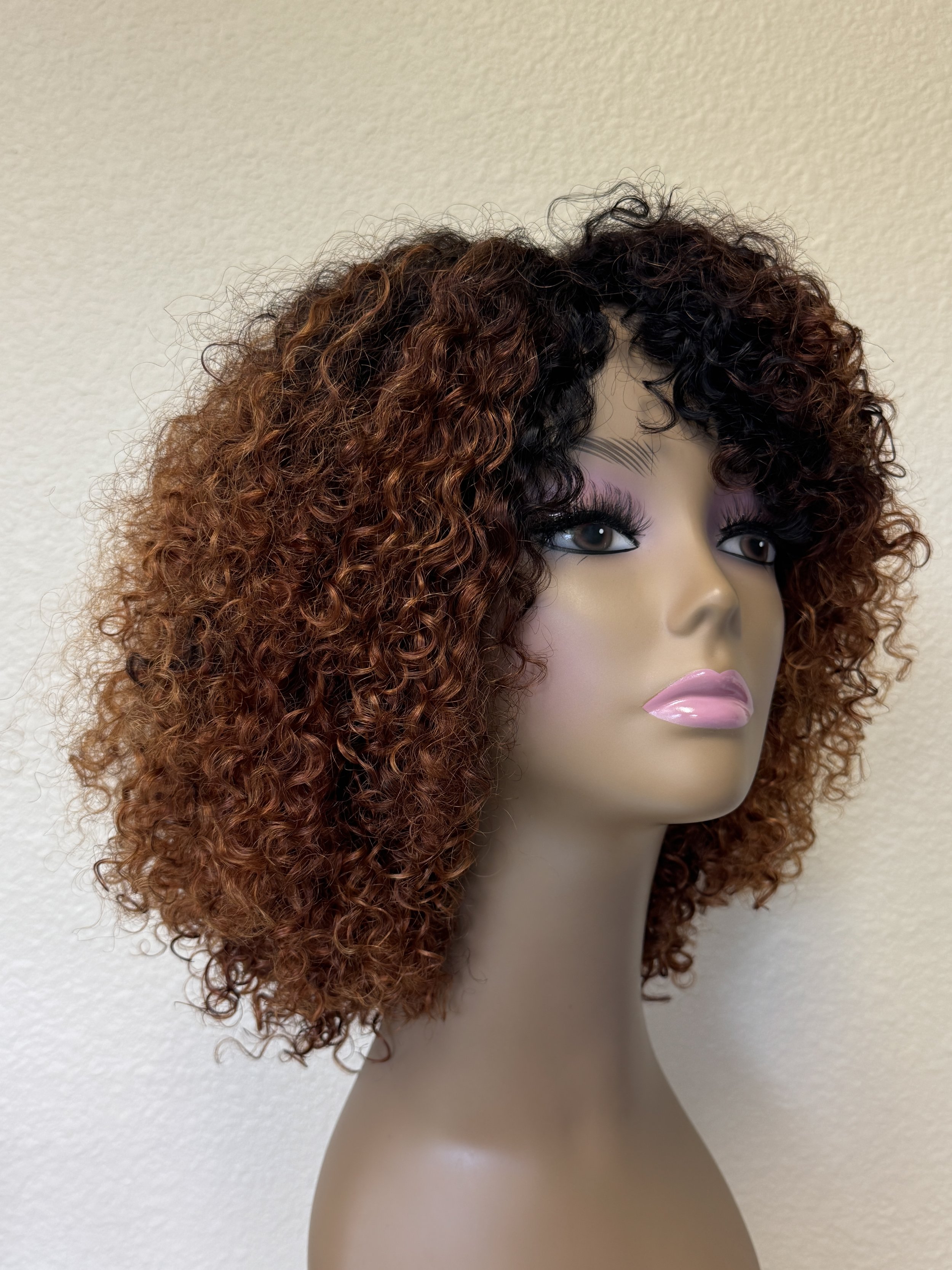 Three-quarter view of a Burmese curly human hair full wig in custom 1B/30 fall shade.JPG