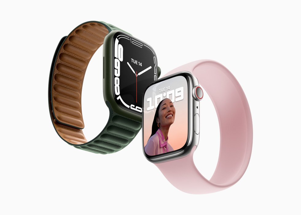 Image of two Series 7 Apple Watches: Olive green with leather band and analog face, pink with silicone band and digital interface.