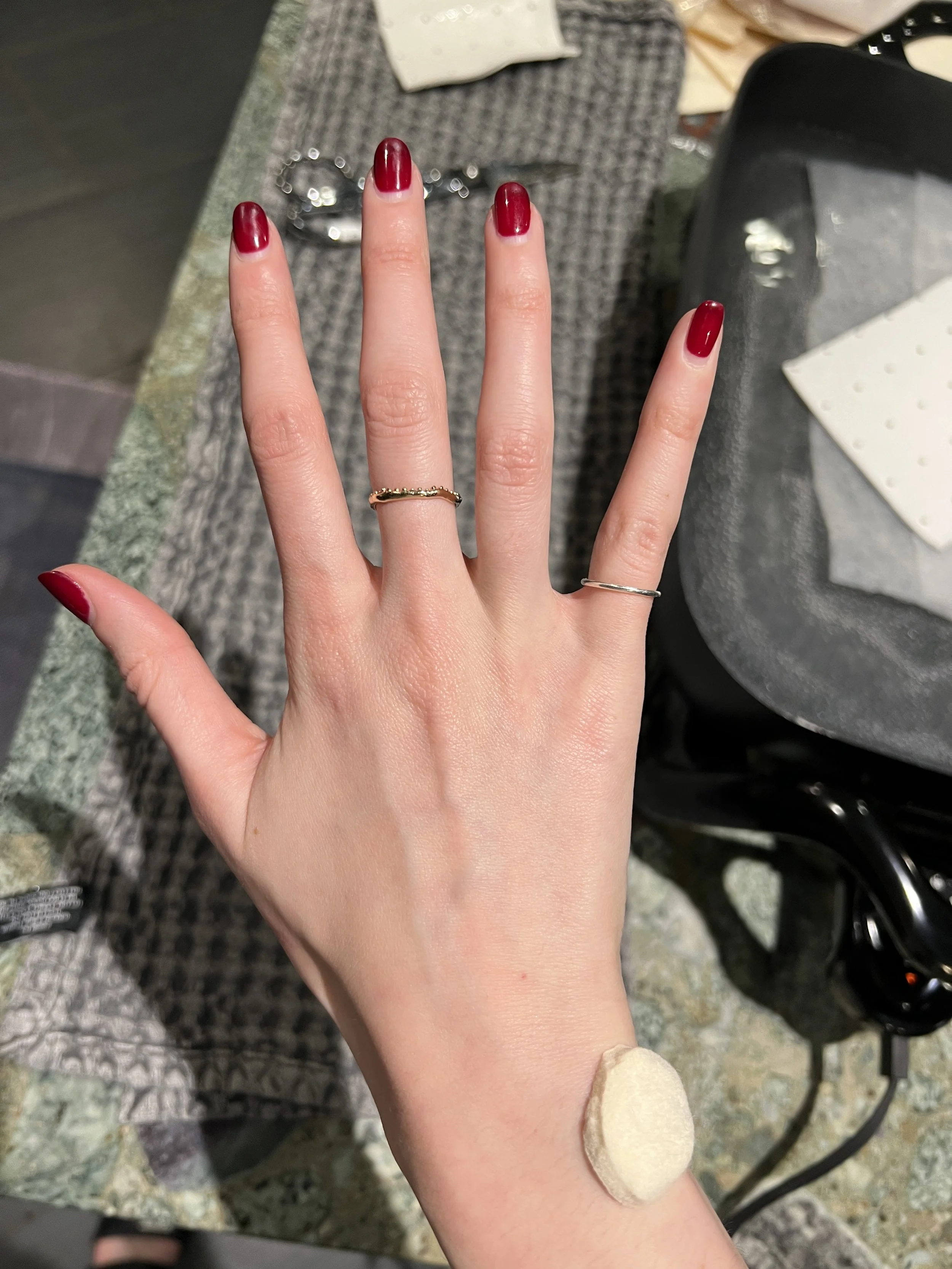 Putting a pad over wrist bone to prevent uncomfortable rubbing