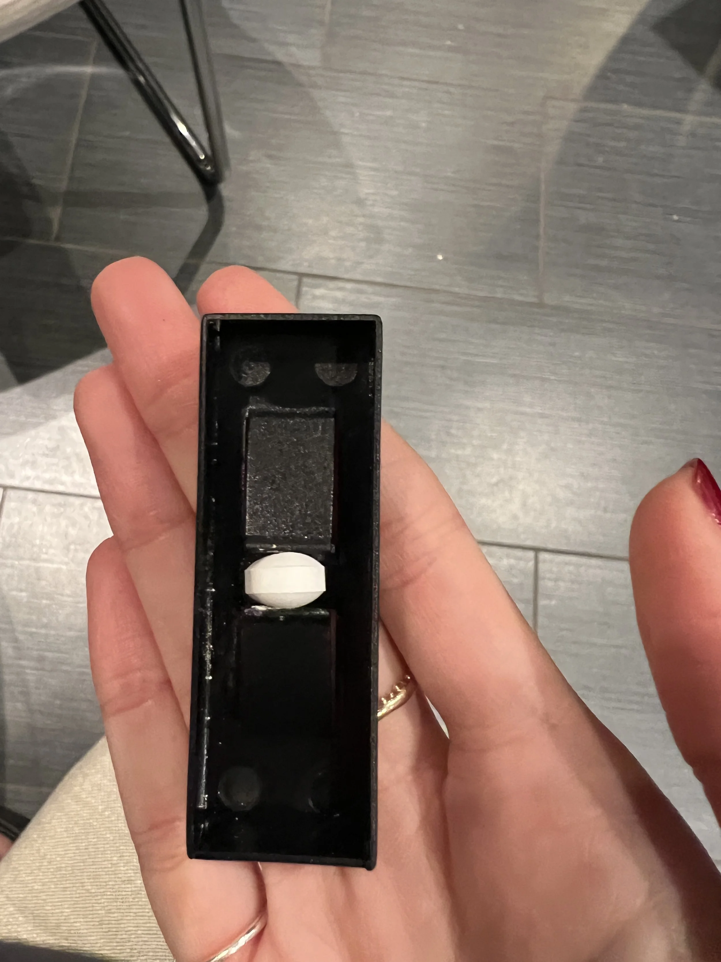 A pill inside the inner compartment