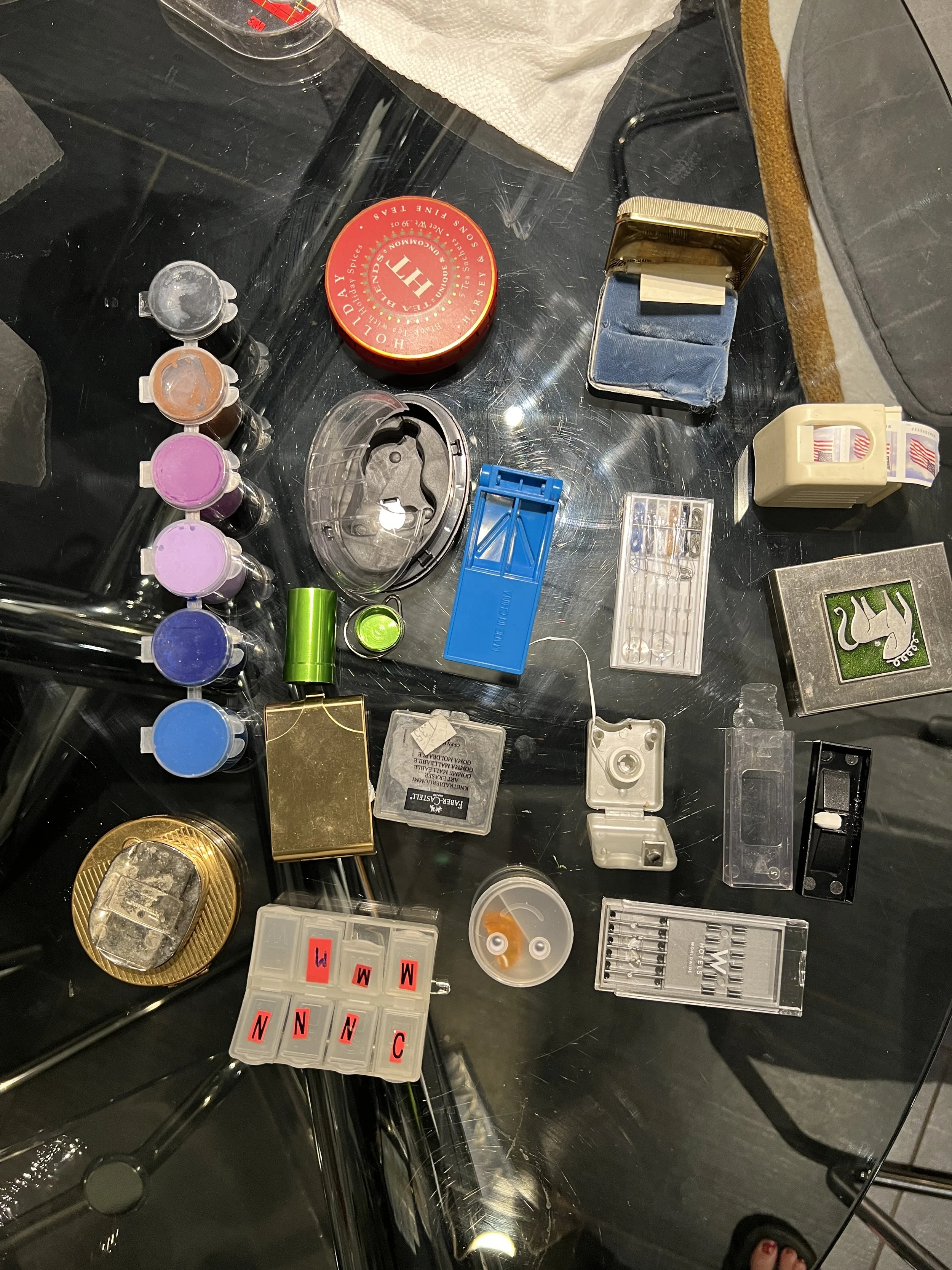 All the objects around the house I considered using as the pill compartment