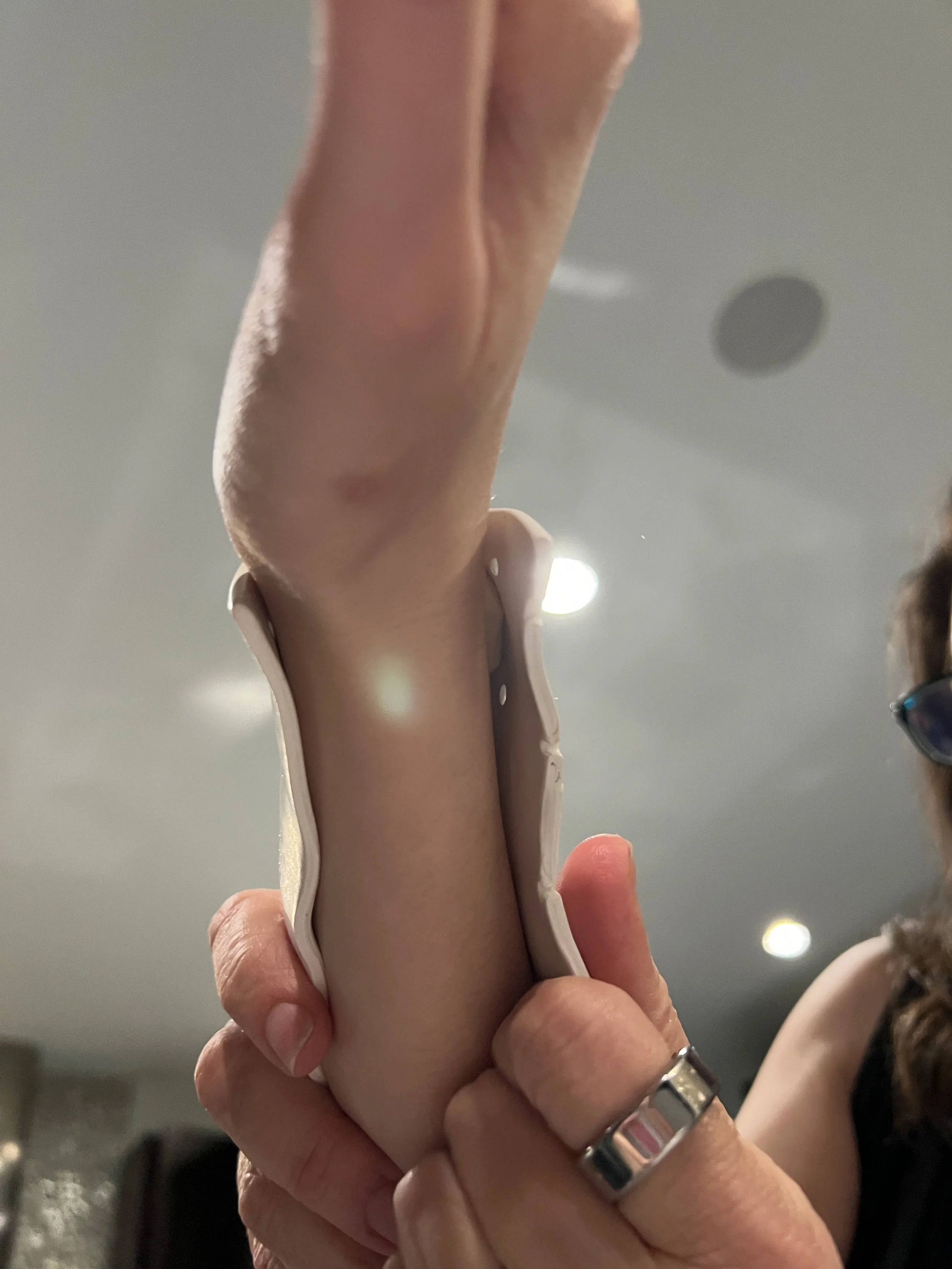 Using gravity to form the thermoplastic to my arm