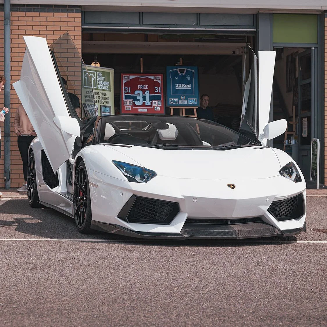 White Lamborghini Aventador protected with paint protection film