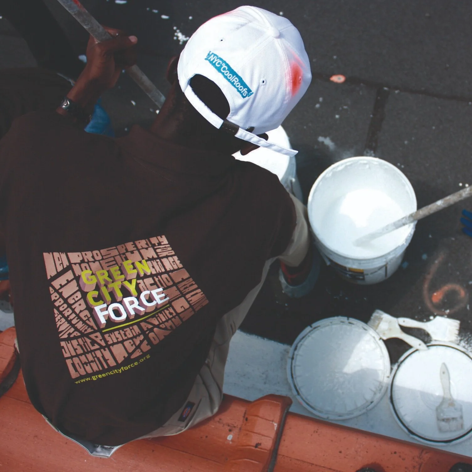 Corps members all have brown shirts - the perspective logo on the back