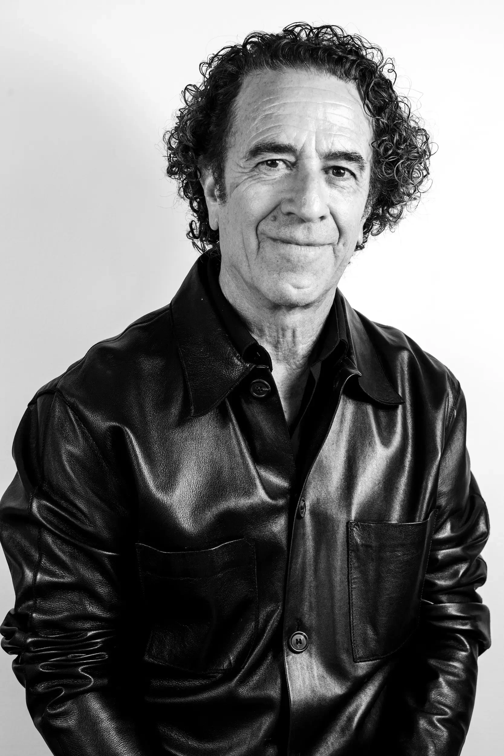 Arthur, a senior hairstylist at Cristophe Salon Beverly Hills, performing a precision dry-cut and architectural hair shaping technique.