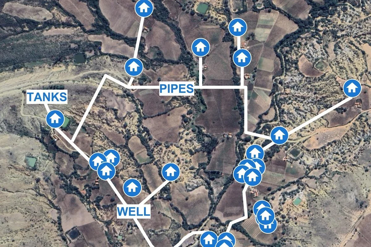 Map of the proposed system showing the well, storage tanks and pipe routes