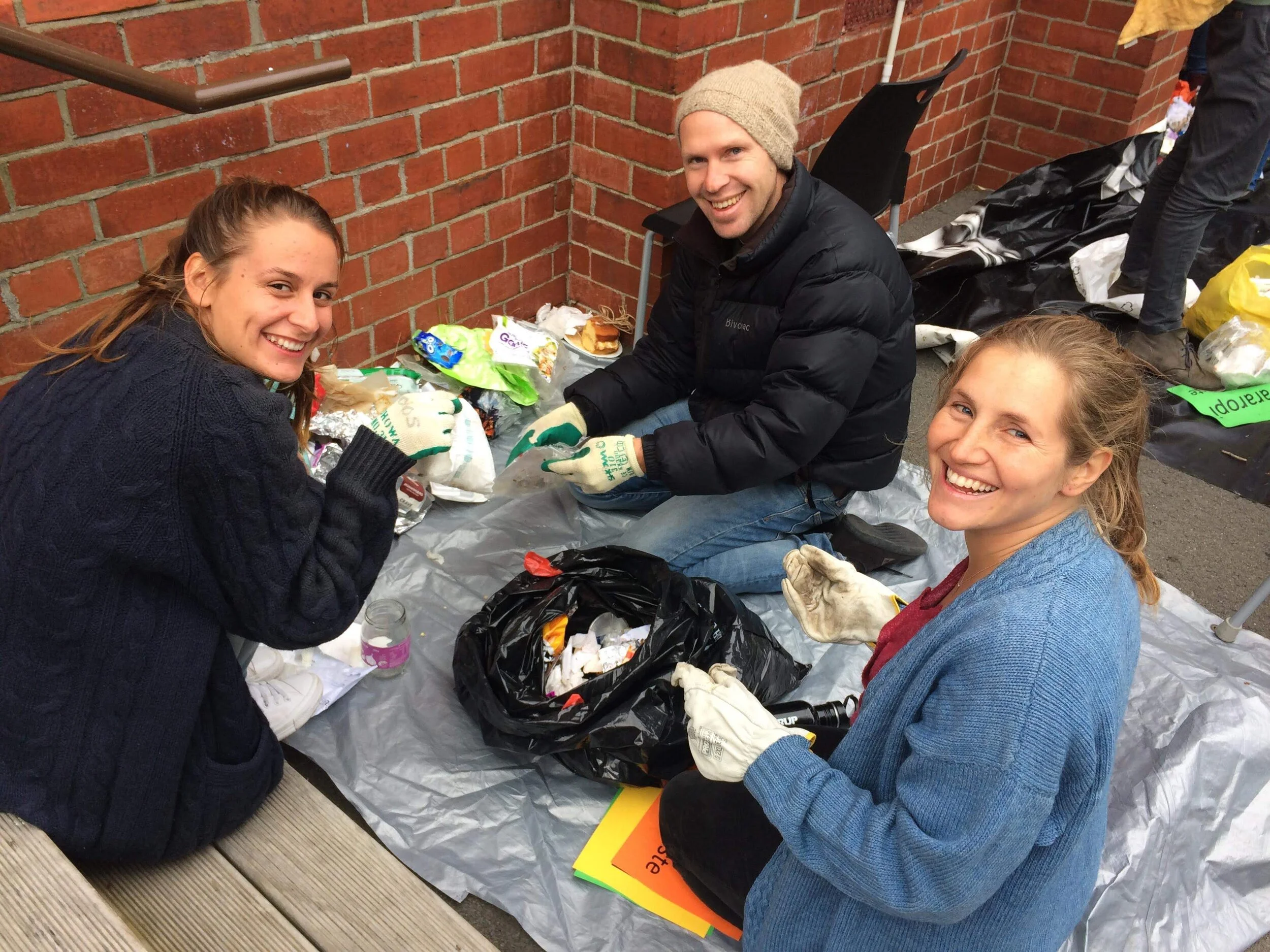Mt. Cook Urban Vision team excitingly excavating their household waste (Photo credit: Elise Ranck)