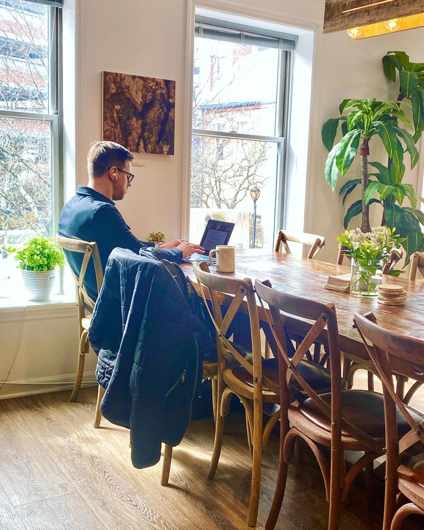 Spring is here! 🌸 Grab a window seat and soak up the sun in our cafe area ☀️ #Productivity #NaturalLight #Cozy #Coworking #MorristownNJ