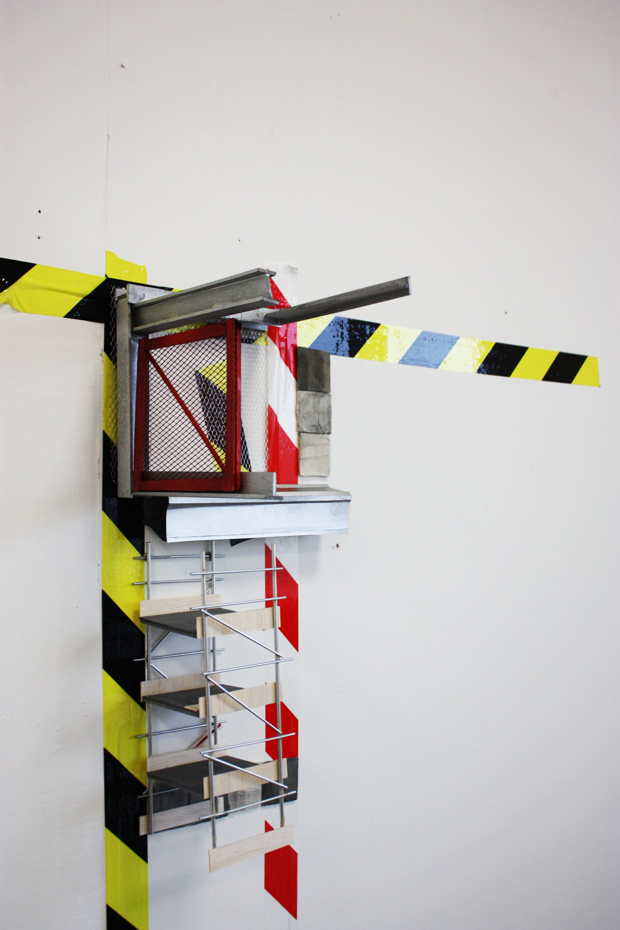  Untitled, mixed media including; paper, wood, metal rods, rug lining, metal gauze, ready mixed plaster, oil, acrylic and spray paints and tape. Dimensions variable, approximately 60 cmx 120 cmx 20cm. Located in F01 