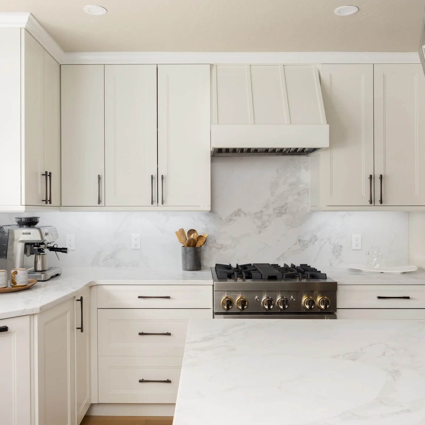 A little before &amp; after magic ✨
This Breckenridge client was ready for a fresh start, and we kept it simple and timeless with classic white cabinets. To warm things up, we added a custom cream color and tied it all together with bright white coun