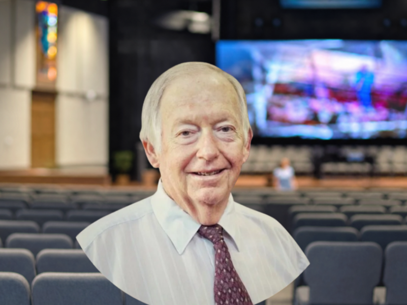 Elderly man in white shirt and patterned tie on a black background