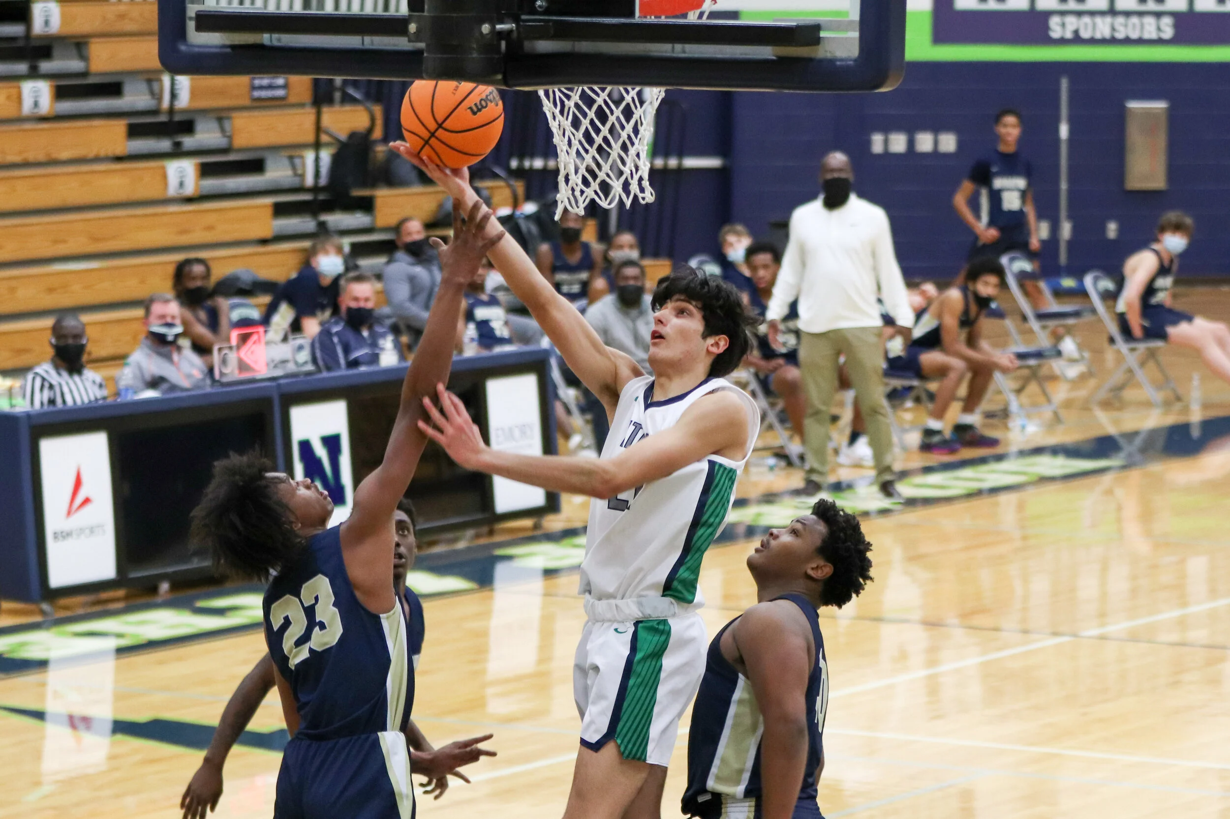 Junior Parker Gonzalez dunks the basketball.