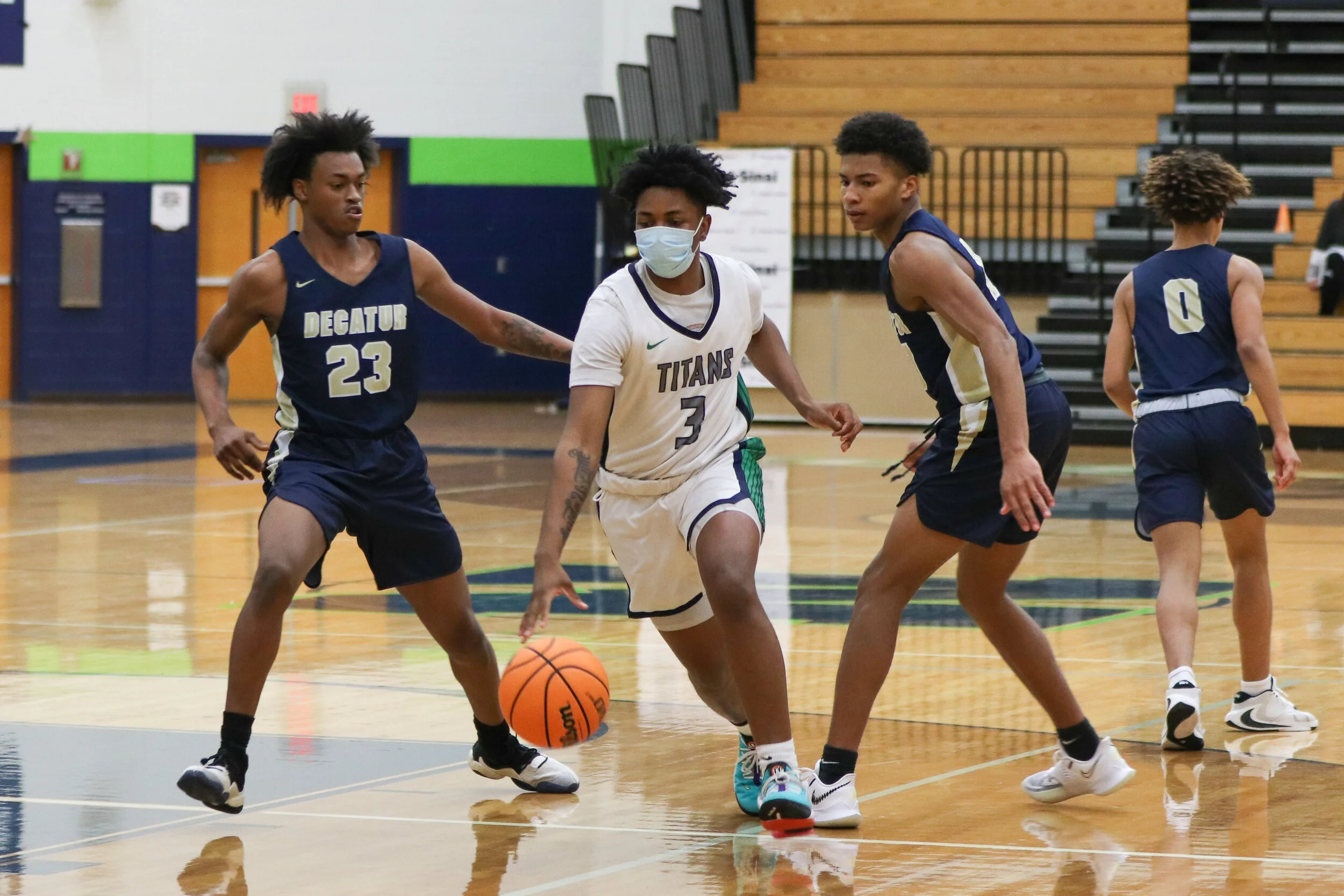 Senior Keshawn Williams escapes two opponents who were guarding him.
