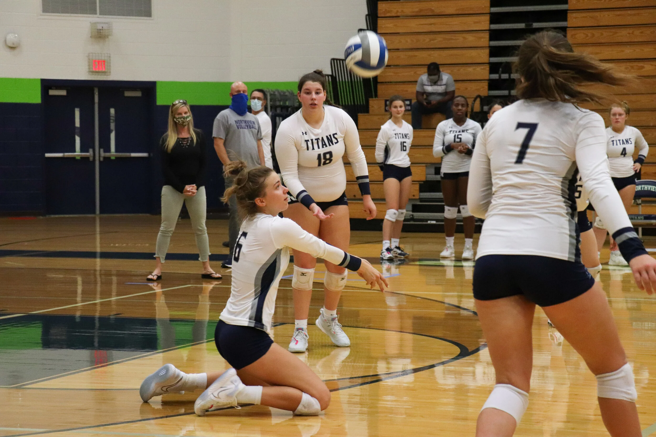 Junior Anastasiya Pervalava passes the ball on her knees to her setter.