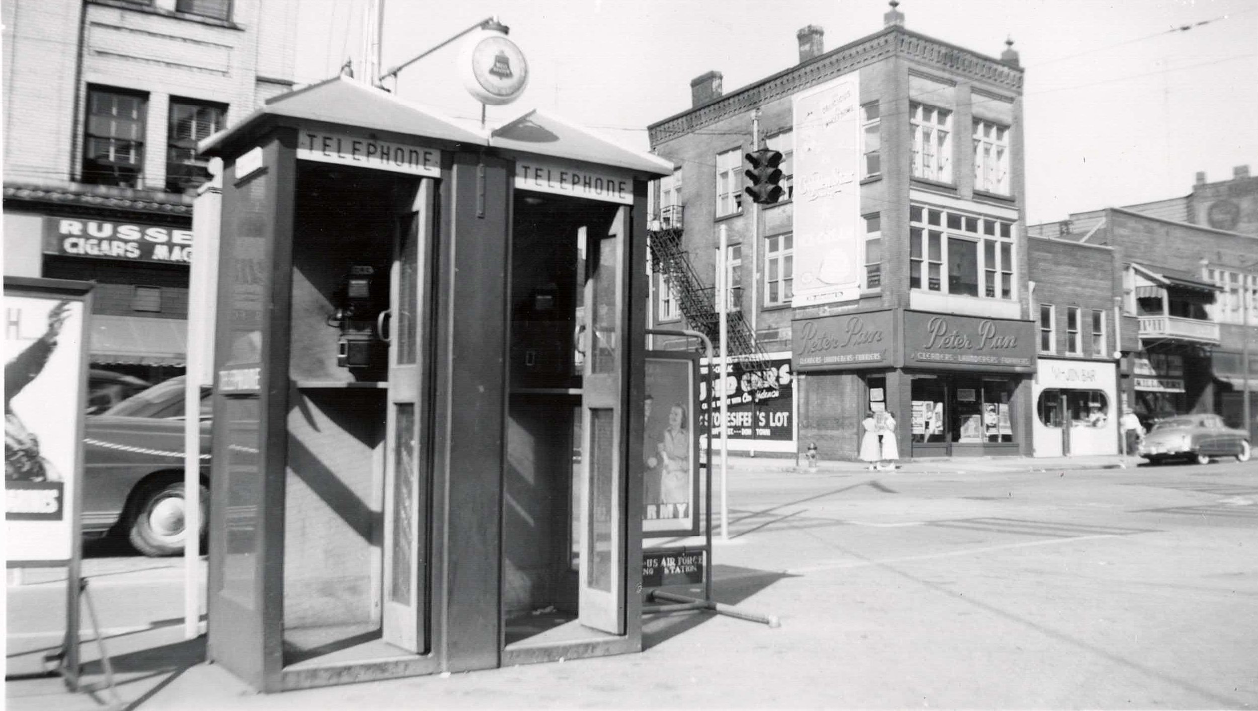 Telephone booths on the Diamond with the Peter Pan store in the background