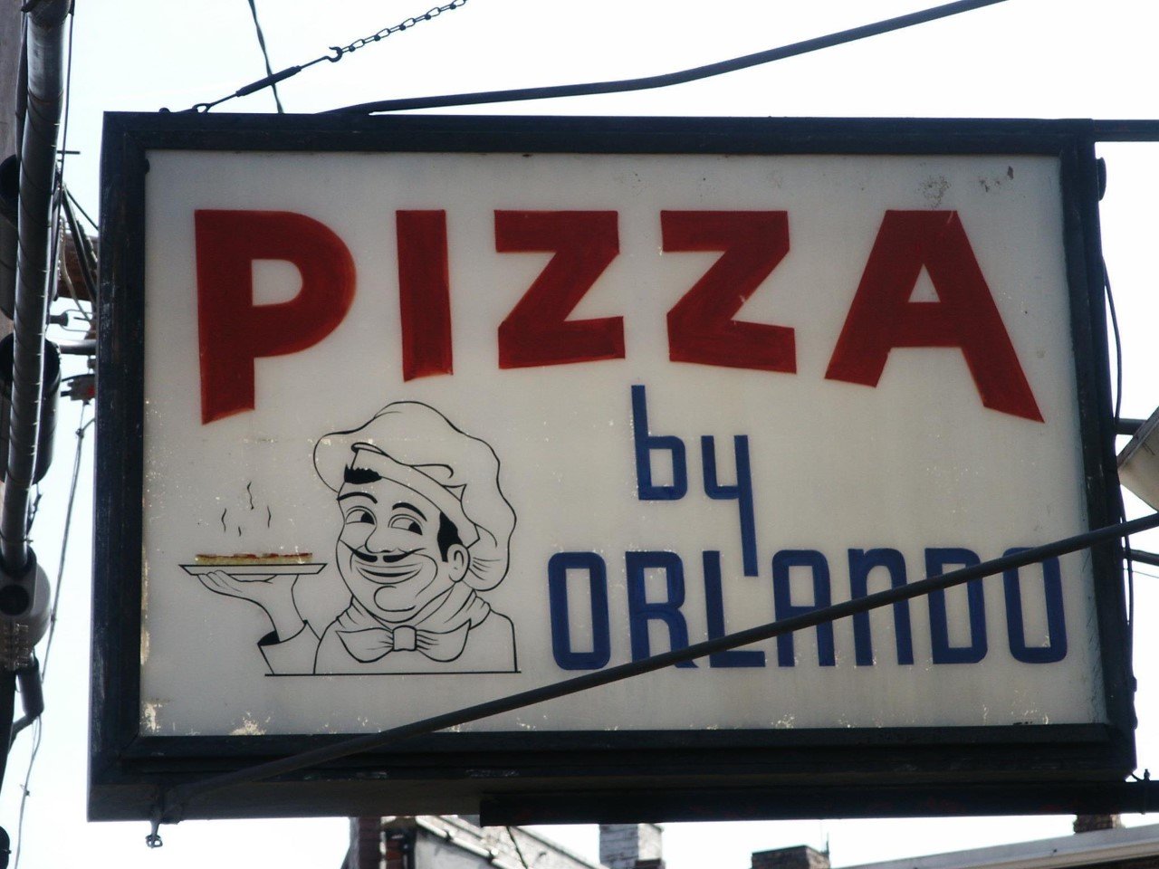 Pizza by Orlando's sign