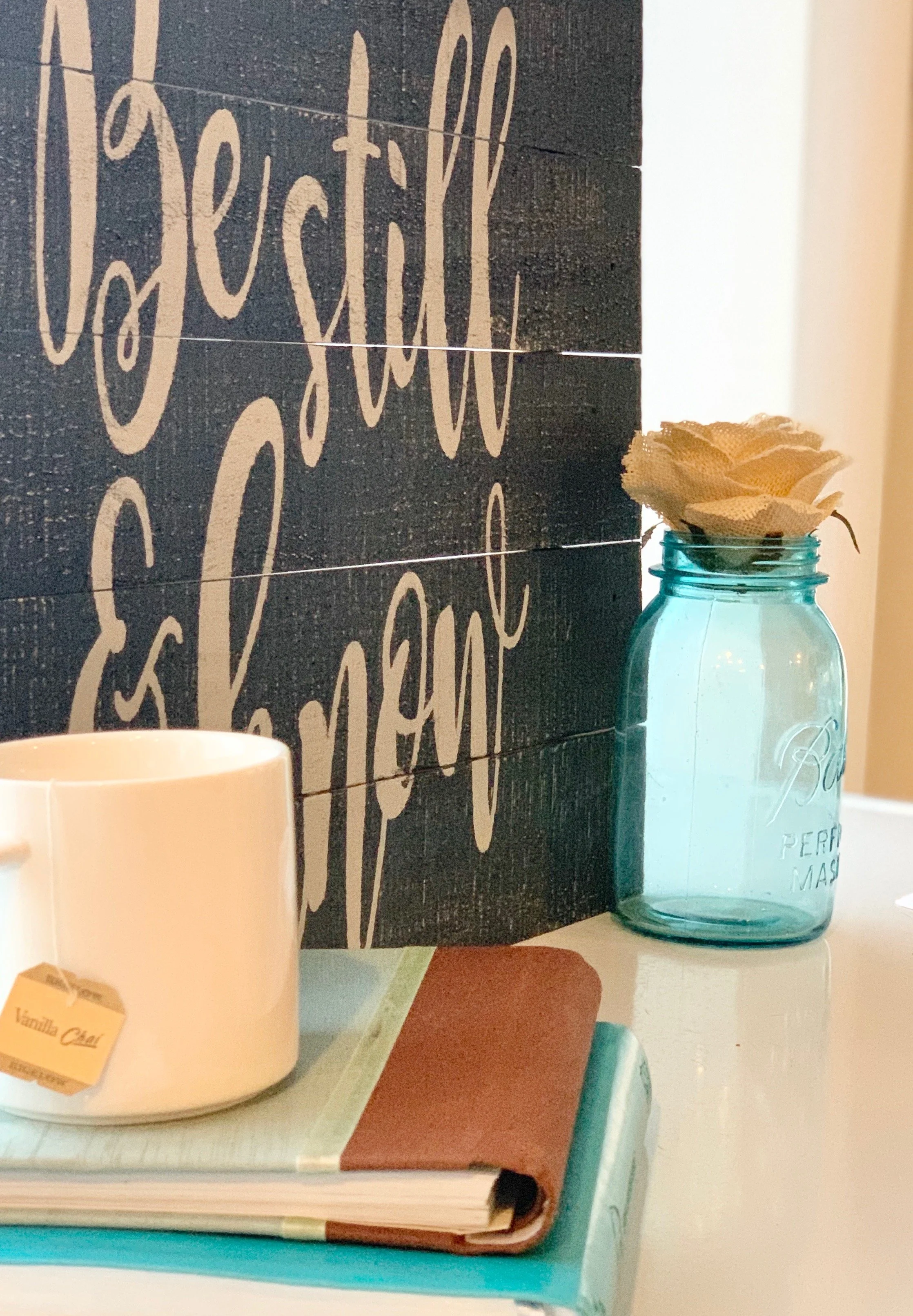 Be Still & Know Poster with coffee mug, books, and Mason Jar