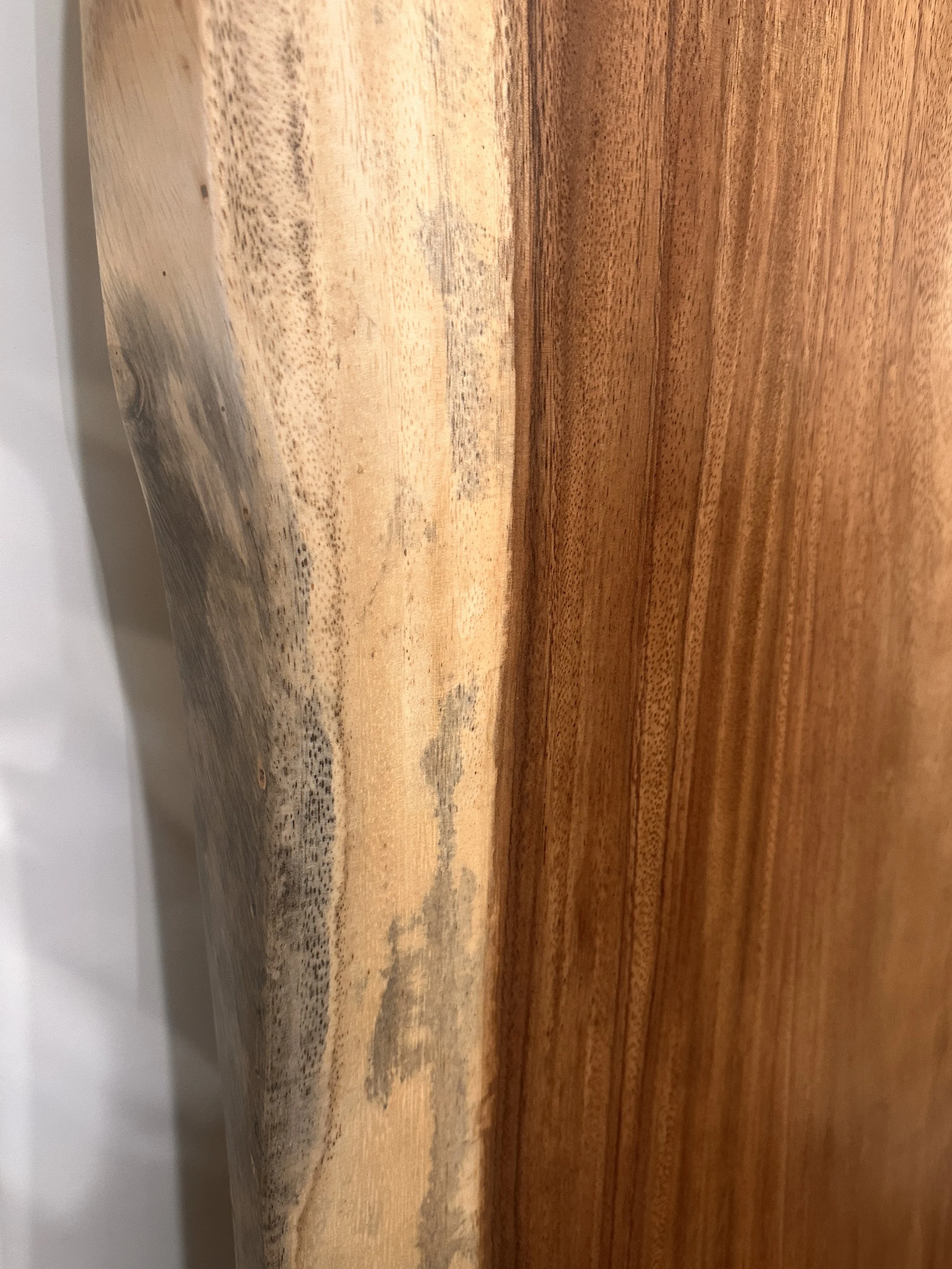 Live edge slab side view of acacia table.JPG