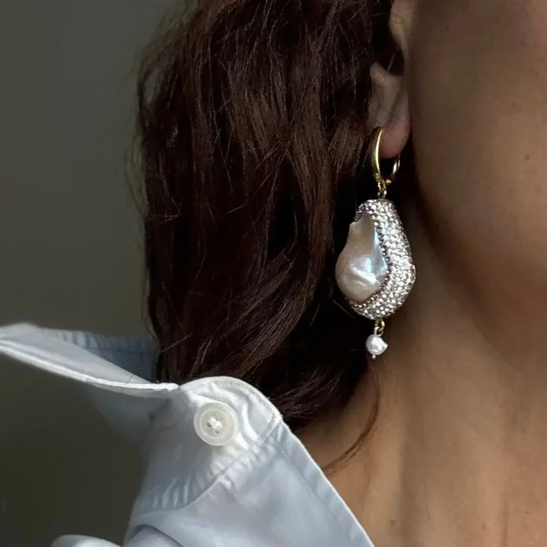 Statemeent Pearl Earrings.webp