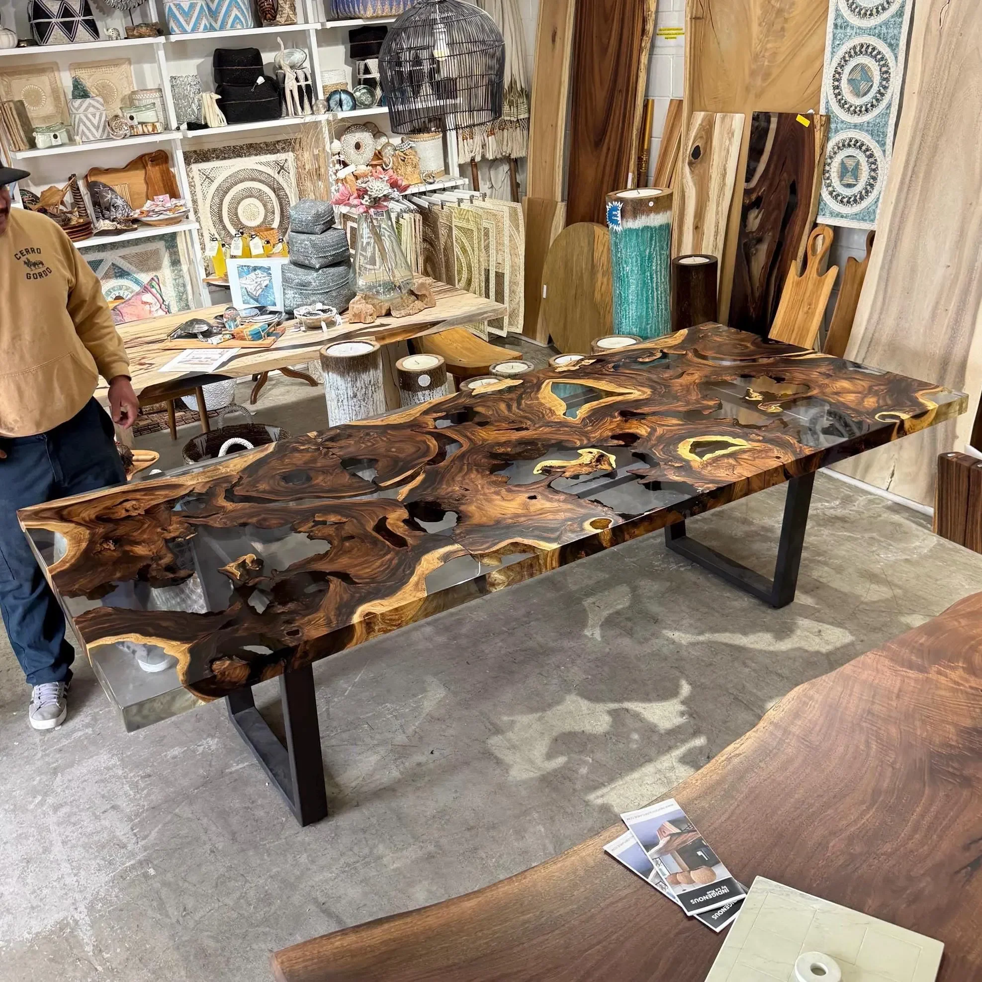 Acacia Resin Crosscut table in store.webp