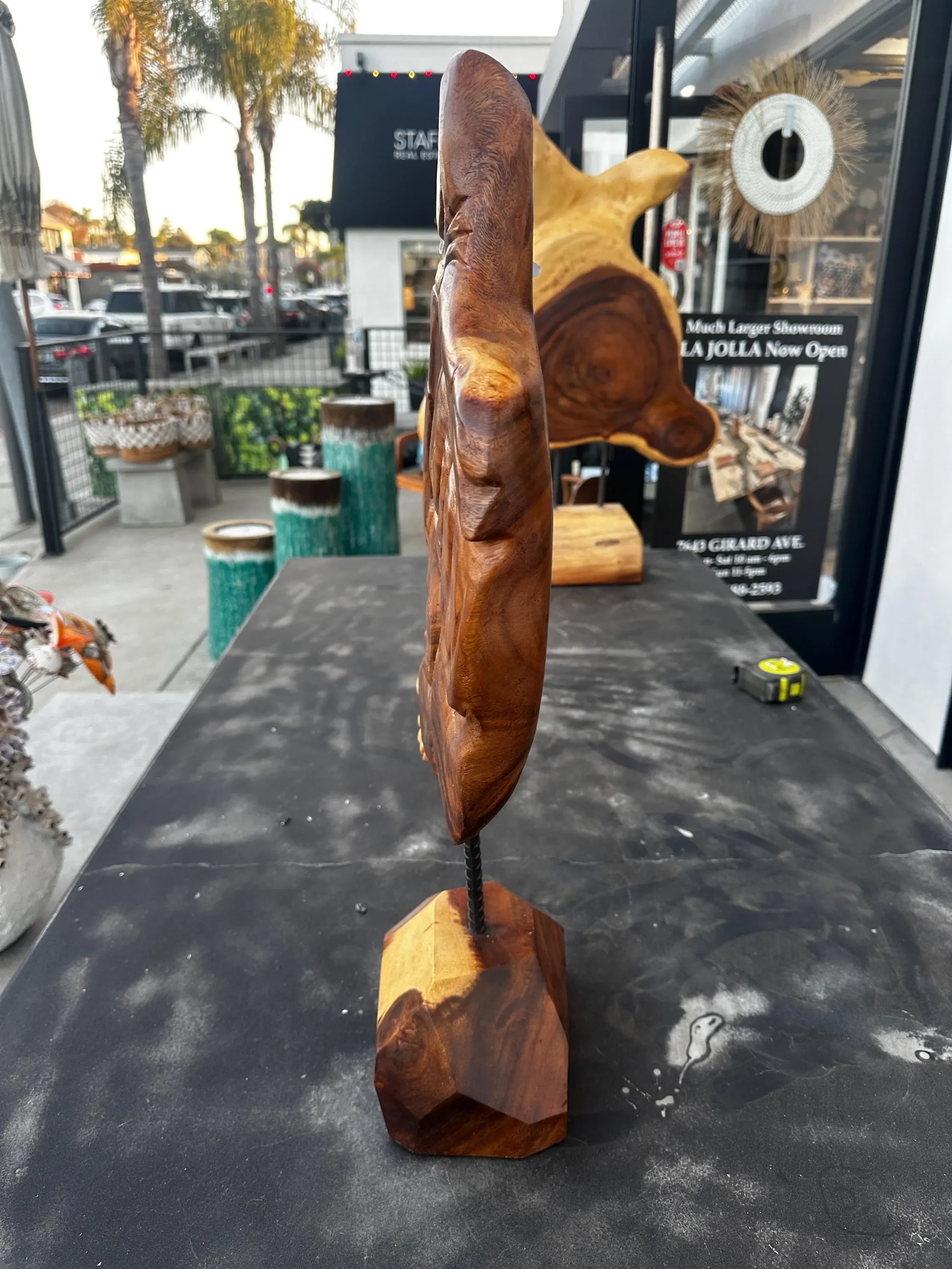 side view of Carved Acacia Sculpture.webp