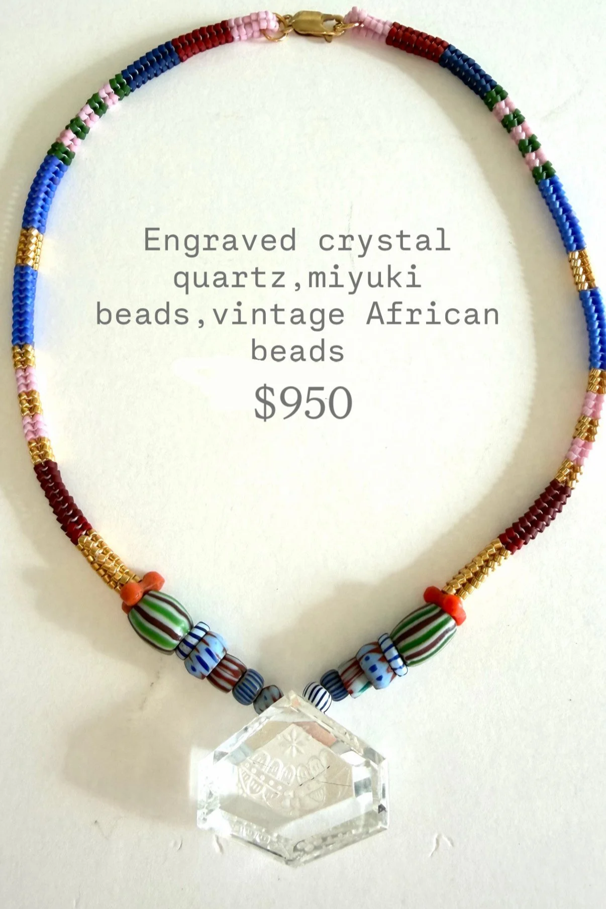 Quartz+crystal+engraved+necklace+with+vintage+african+beads.png