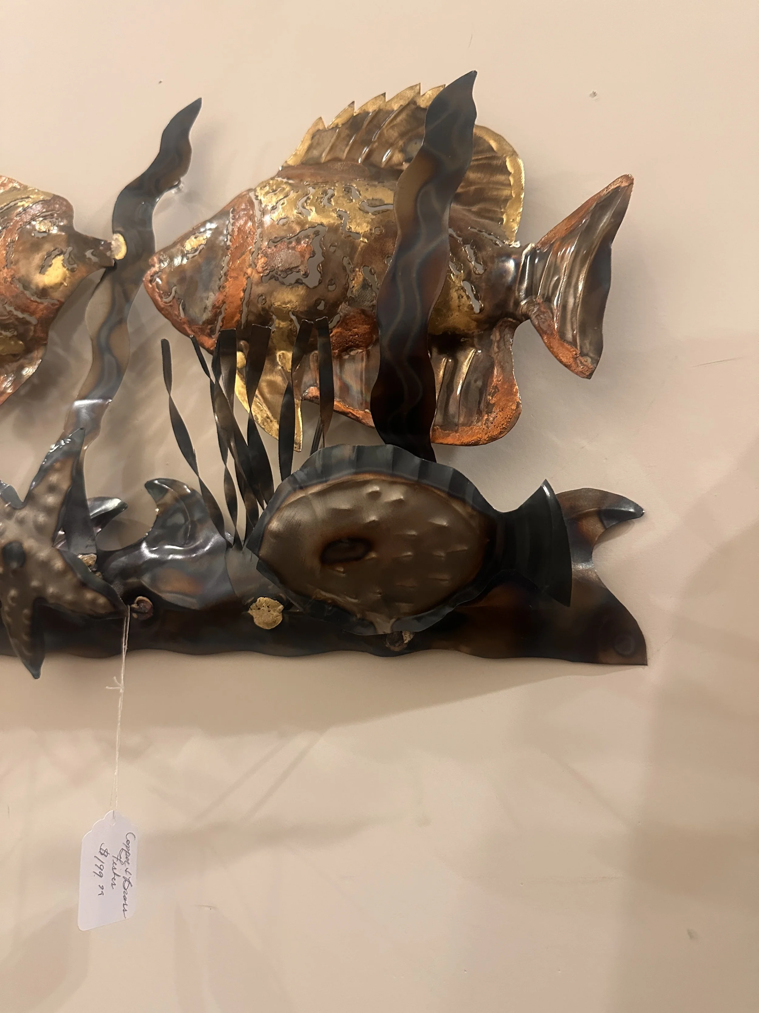 Brass fishes and starfish.JPG