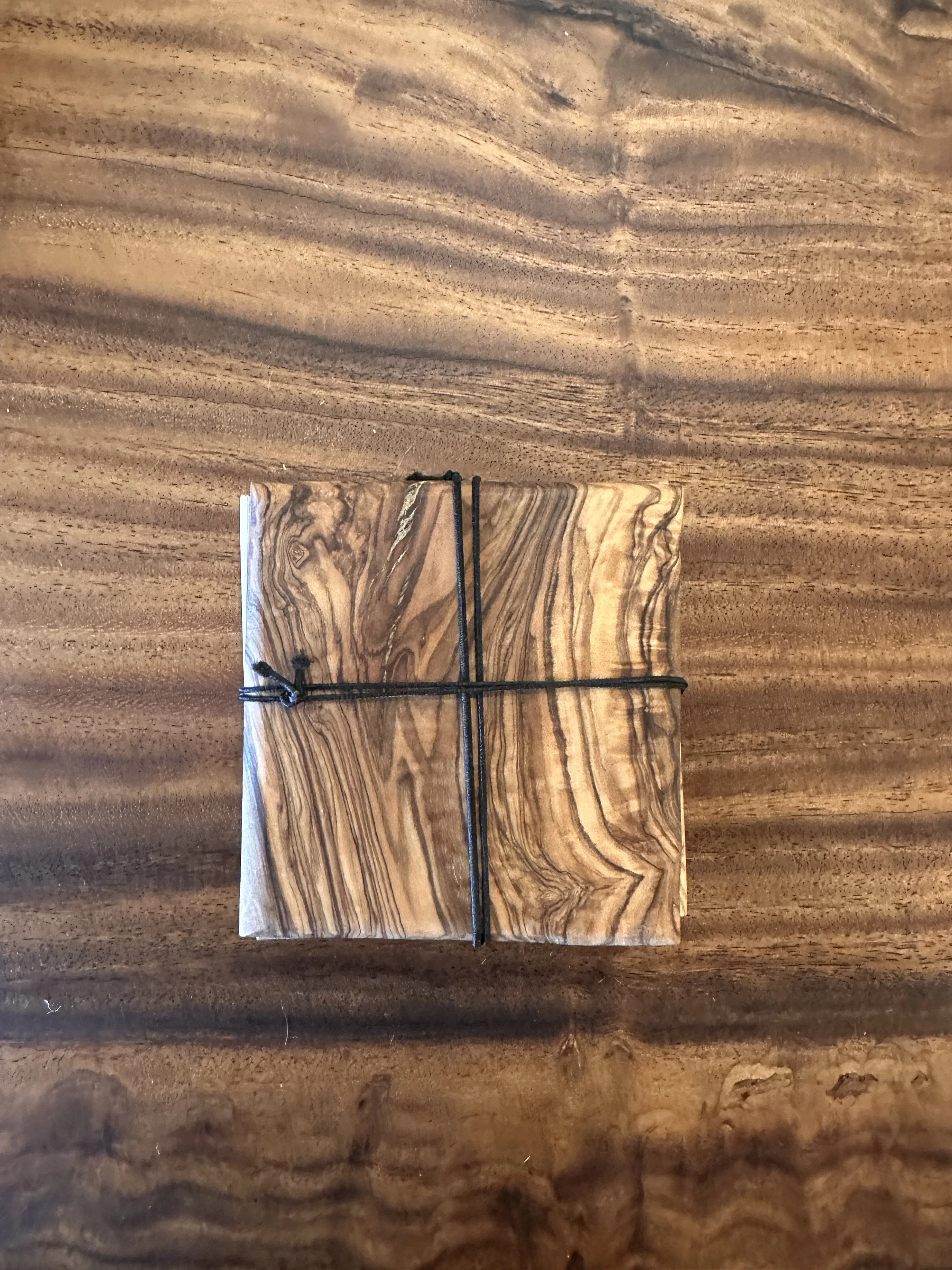 set of 4 olive wood coasters.JPG