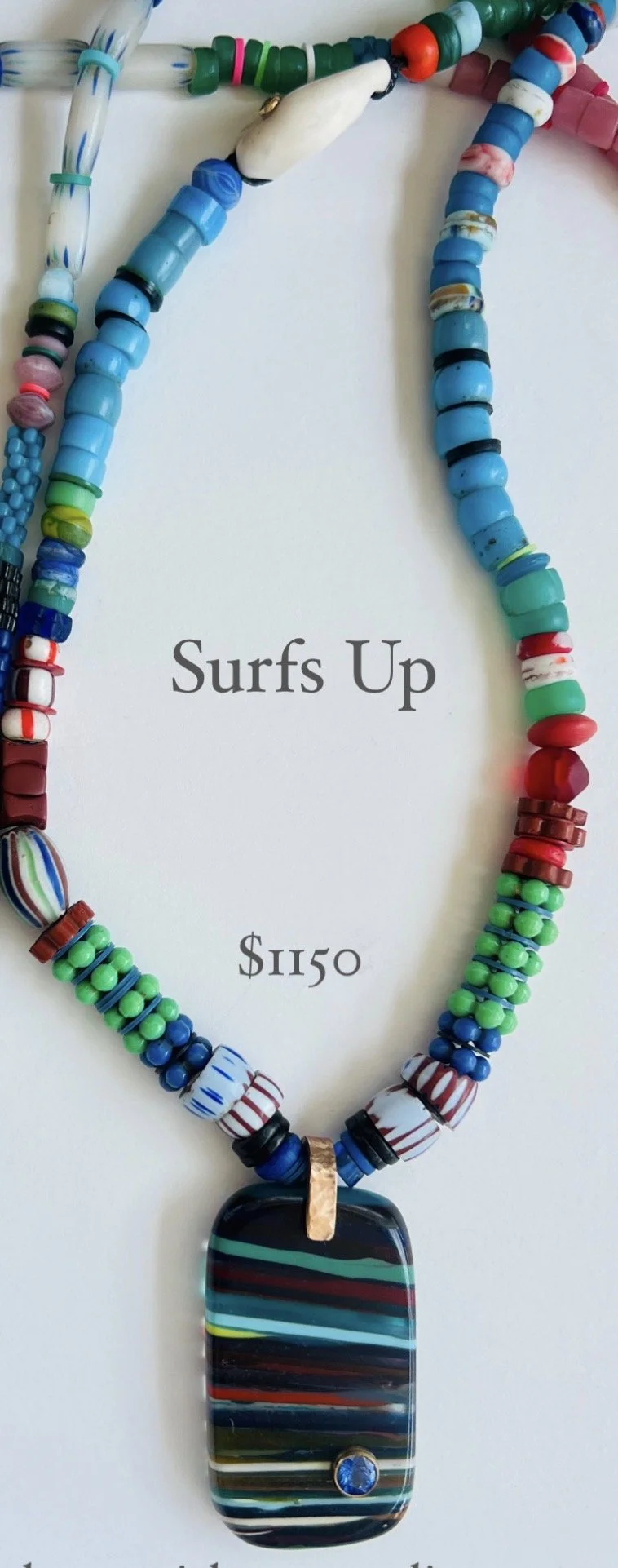 FOrdite Pendant  on African bead strans.jpg