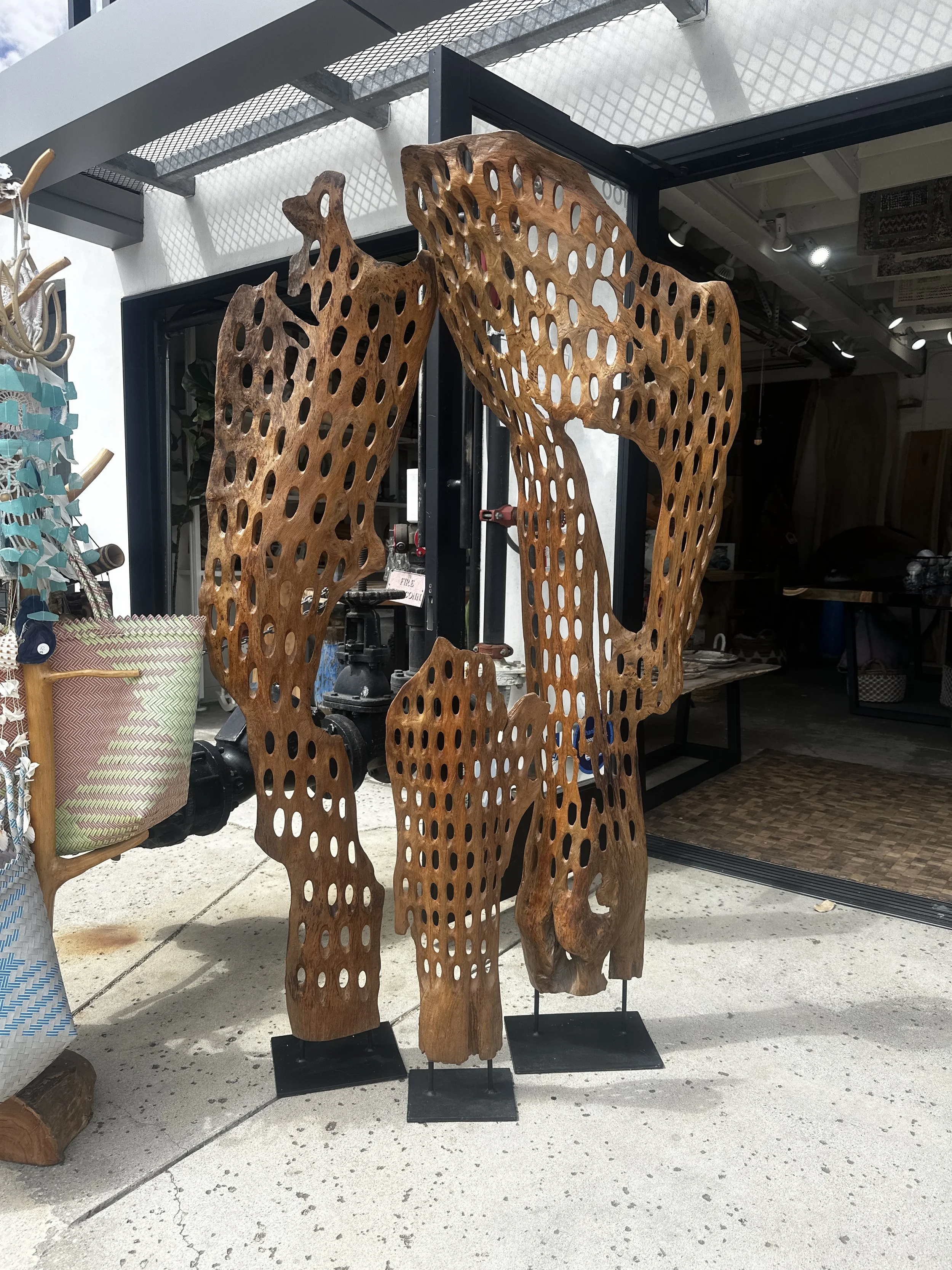 Teak Sculptures grouped together.jpeg