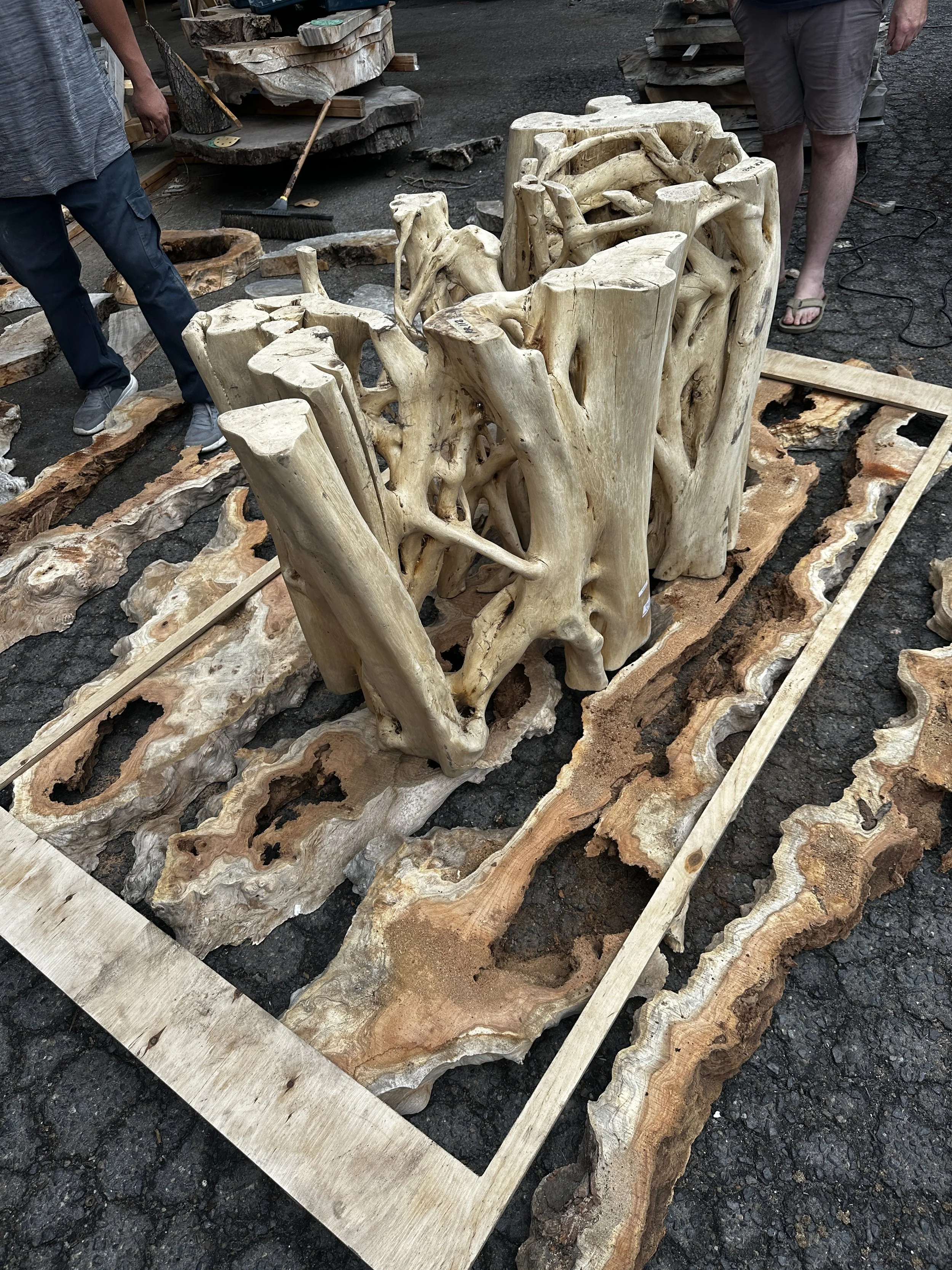 Live edge wood slabs for custom resin tables at Indigenous by La Rue in San Diego