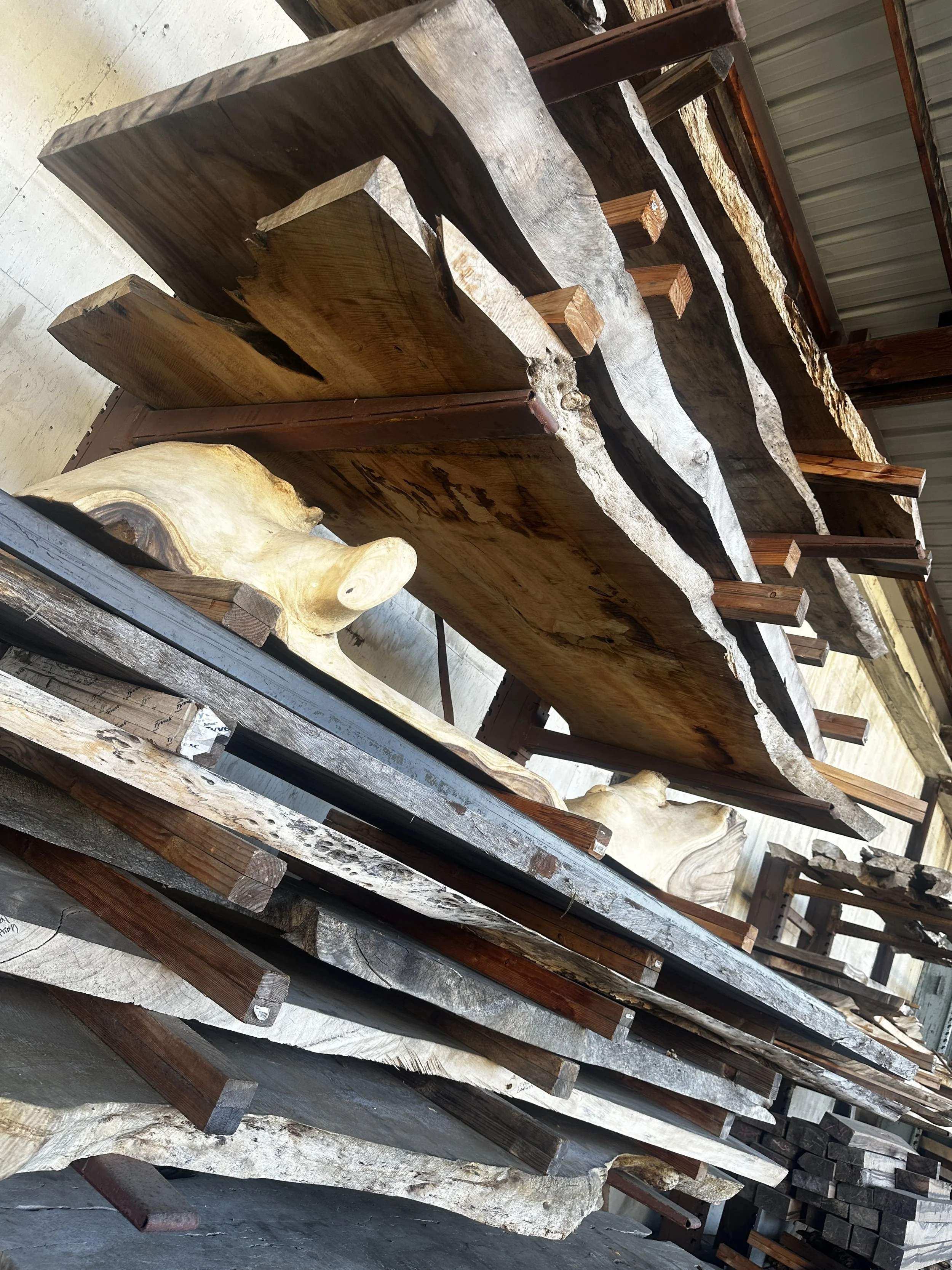 Live edge wood slab selected for a custom dining table at Indigenous by La Rue San Diego