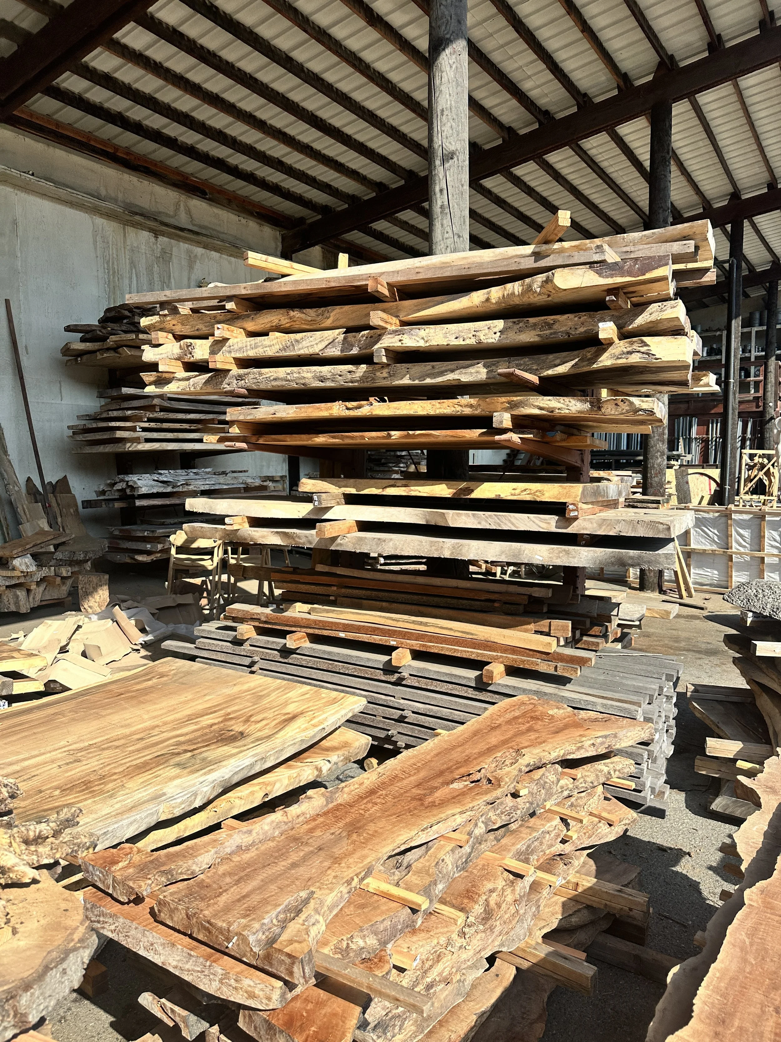 Live edge wood slabs available for custom furniture at our San Diego lumberyard