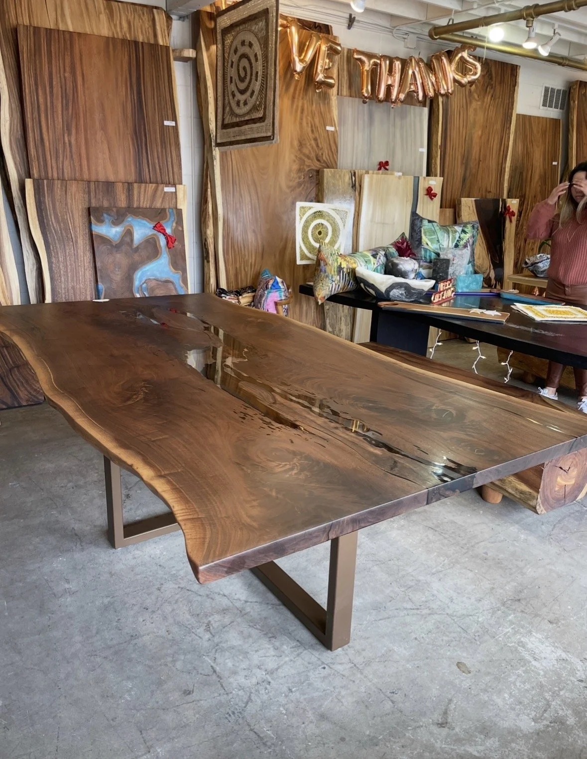 Oversized custom walnut live edge dining table handcrafted by Indigenous by La Rue in San Diego