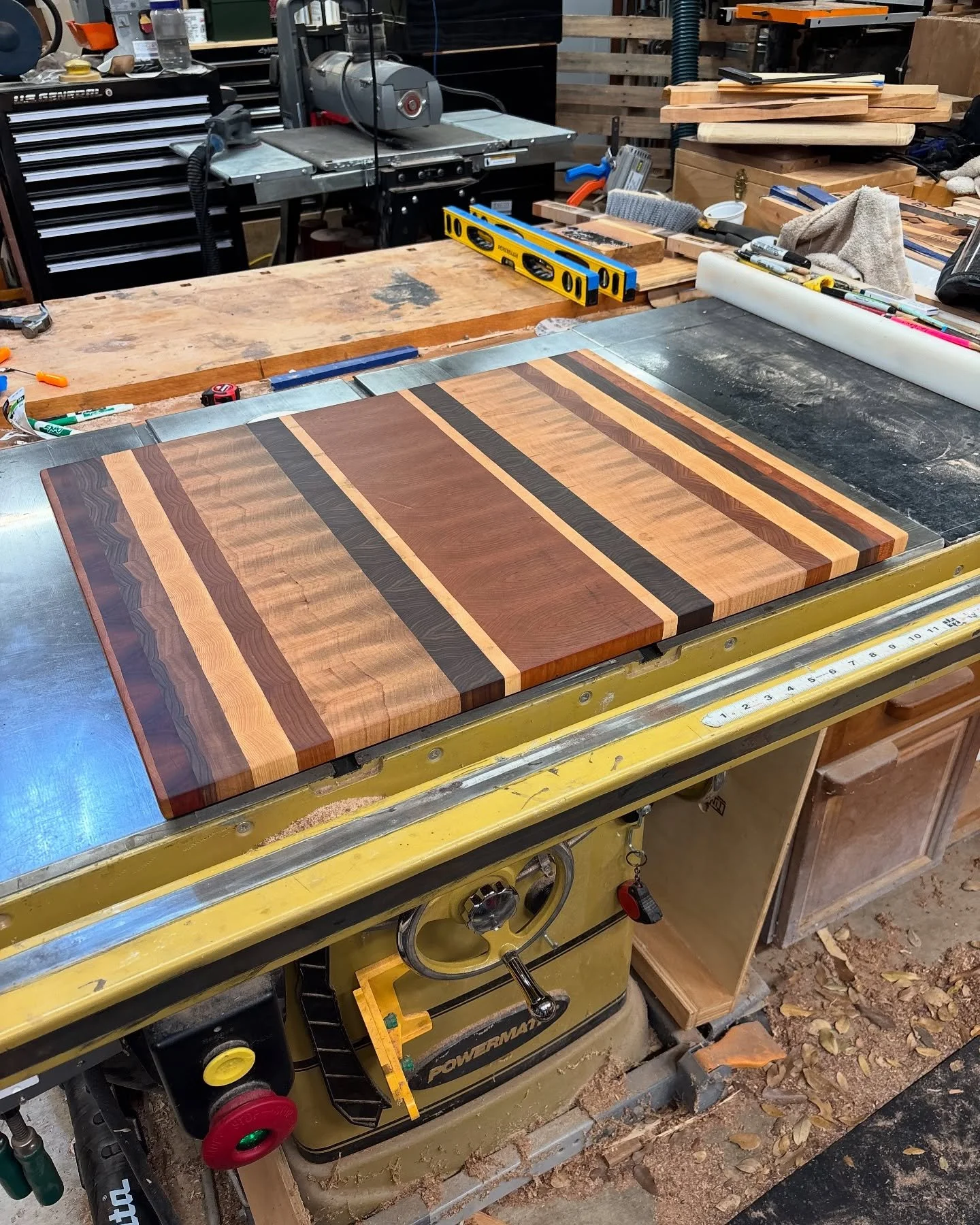 Finished this monster 30&rdquo; wide by 24&rdquo; deep end grain dough board for a friend and neighbor who has a killer set up for making pizzas on their back patio. 

It is made from a combination of maple, walnut, cherry, and native Texas pecan and