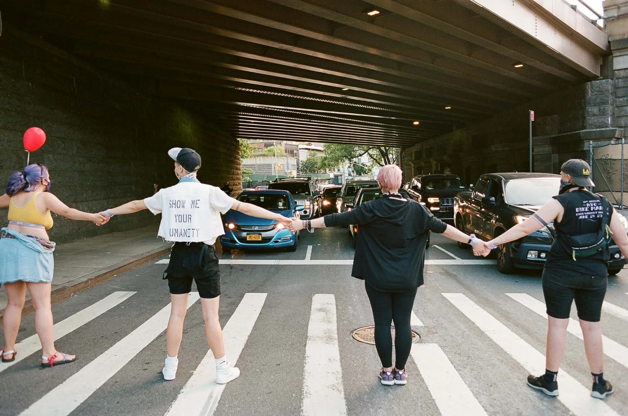 Blocking Traffic for the Juneteenth March —  June 19, 2020, Dumbo, Brooklyn, NY.

Shot on 35mm Kodak Portra 400 using a Nikon F2s. © 2020 Gavin Haag