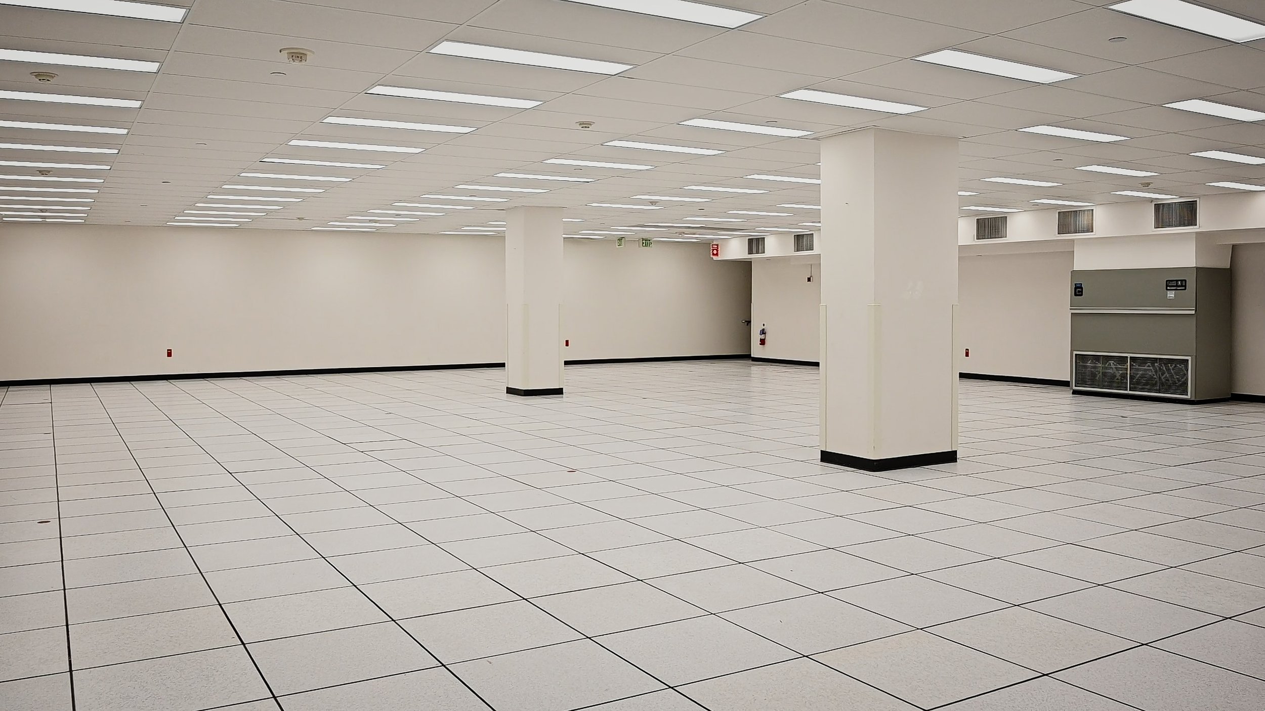 Professional facility photography showing industrial space layout and infrastructure systems