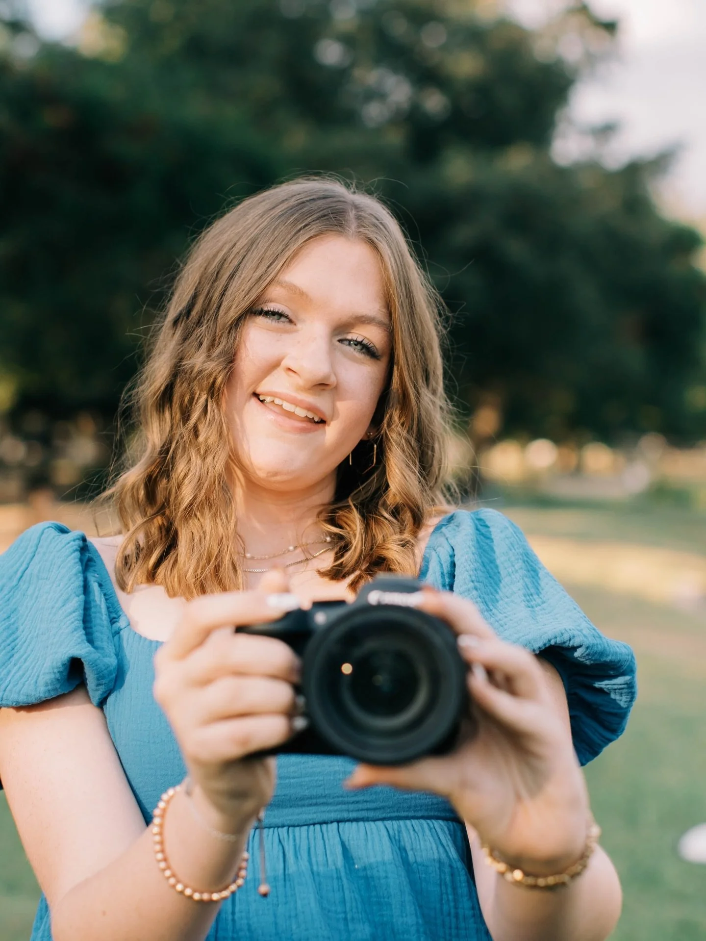 Just a girl &amp; her camera 😃

I'm obsessed with Madeline's fall senior portraits! This new location stole my heart with its stunning light and scenery.

We did a fun mixture of playful poses and candid shots, I really love few we took with Mom. It