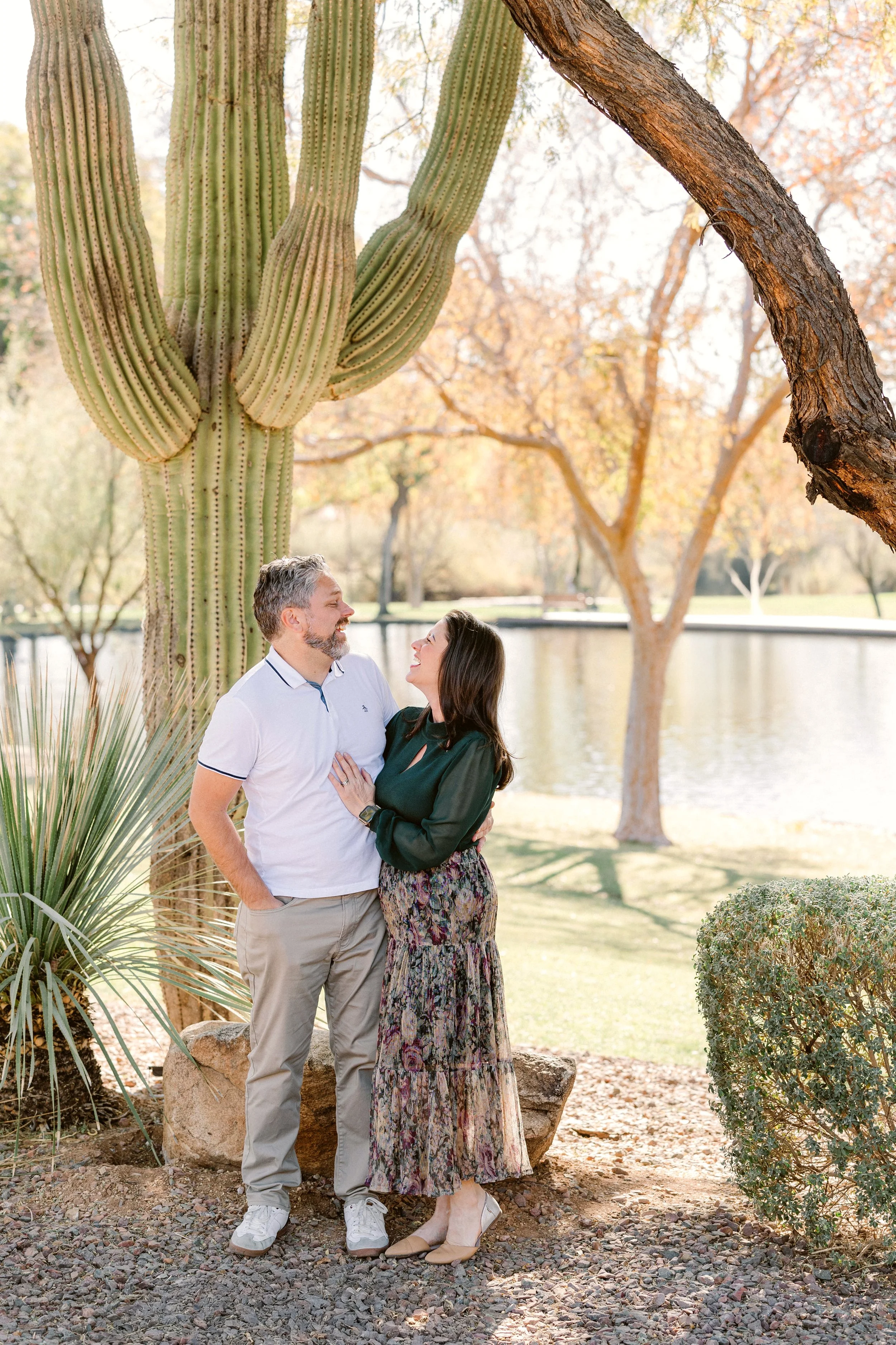 anthem-arizona-family-session-parents-laugh-playfully.jpg