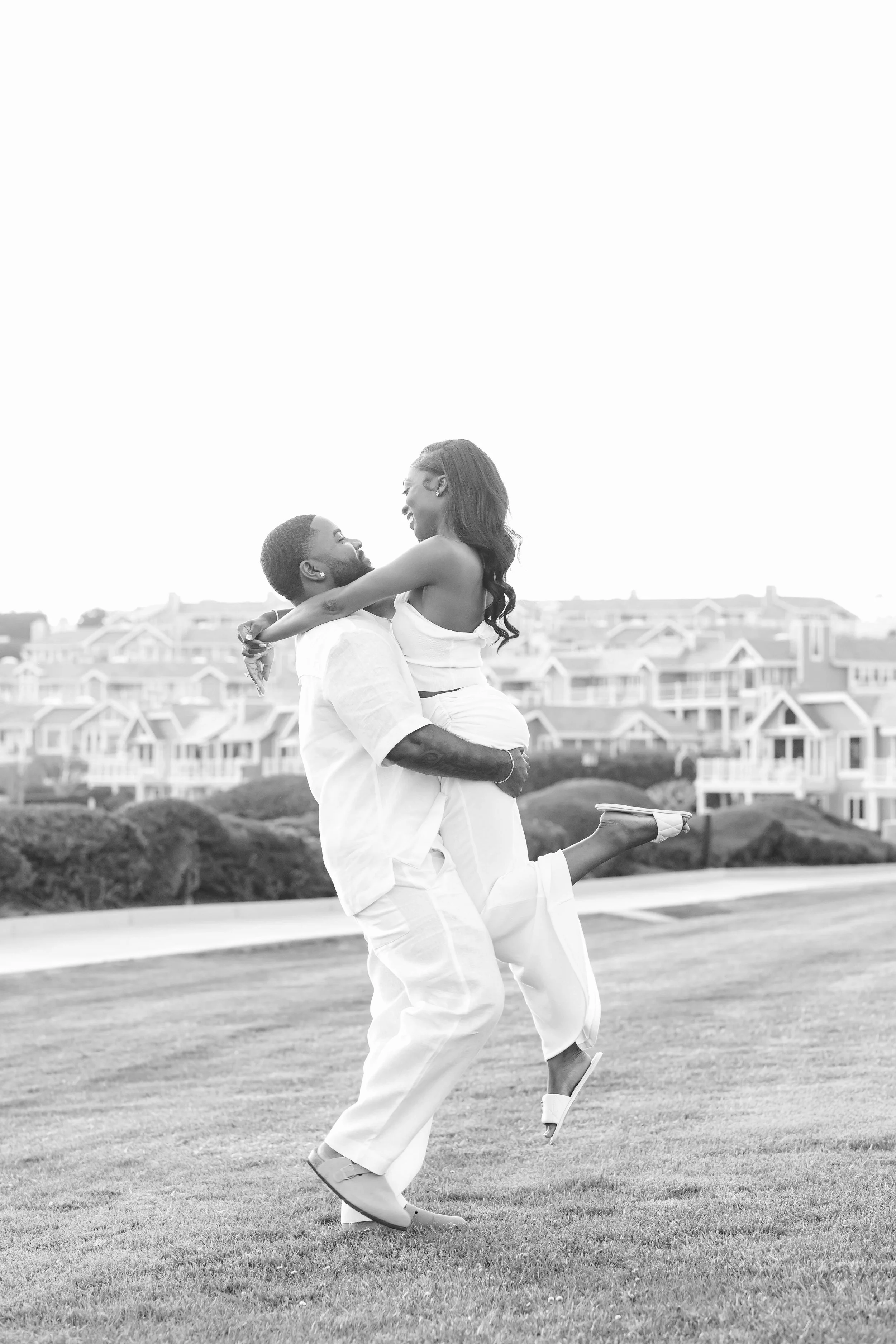 Dana Point engagement session lift and spin.jpg