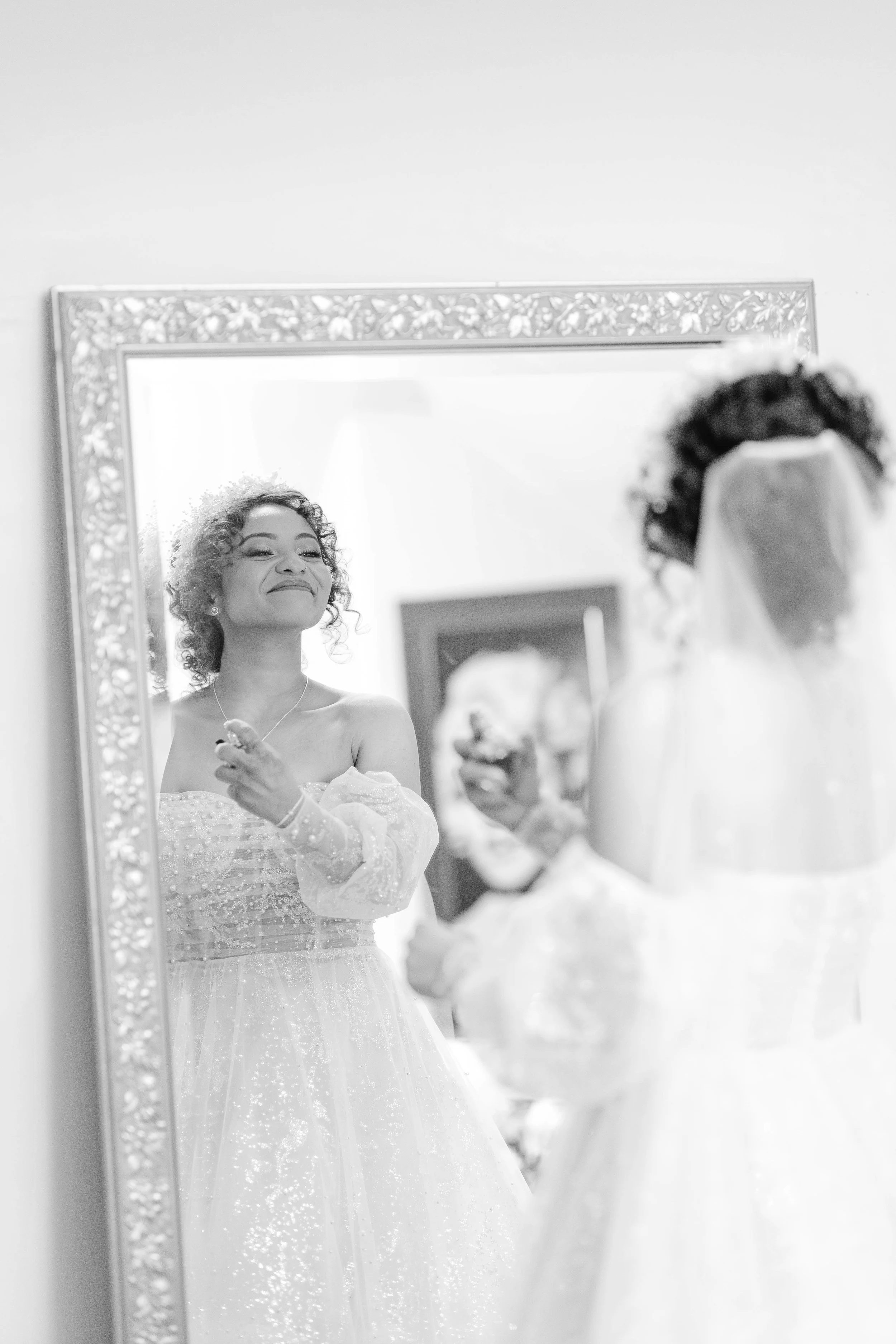 loft-84-wedding-bride-getting-ready-in-front-of-mirror.jpg