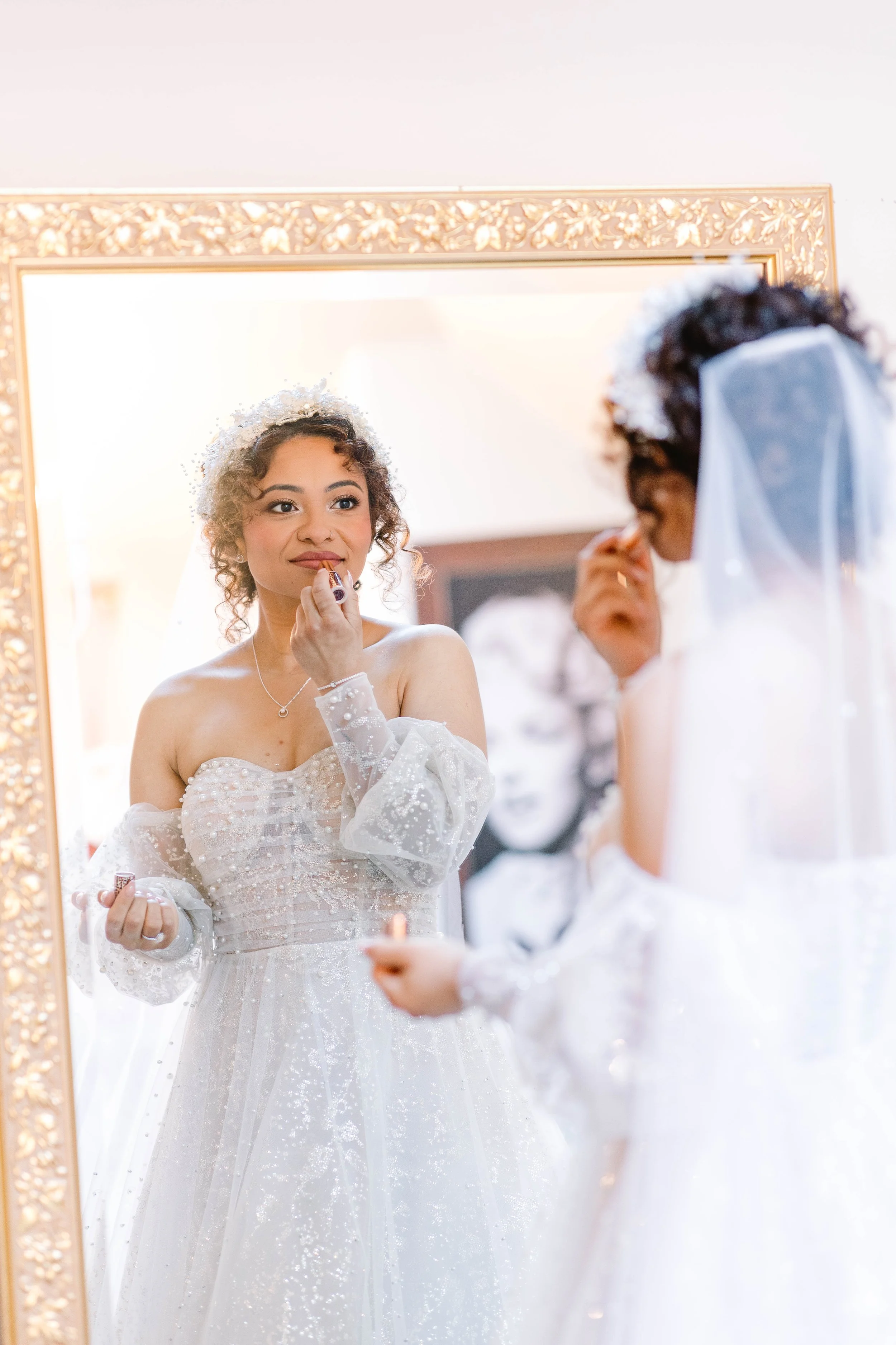 loft-84-wedding-bride-getting-ready-in-front-of-mirror.jpg