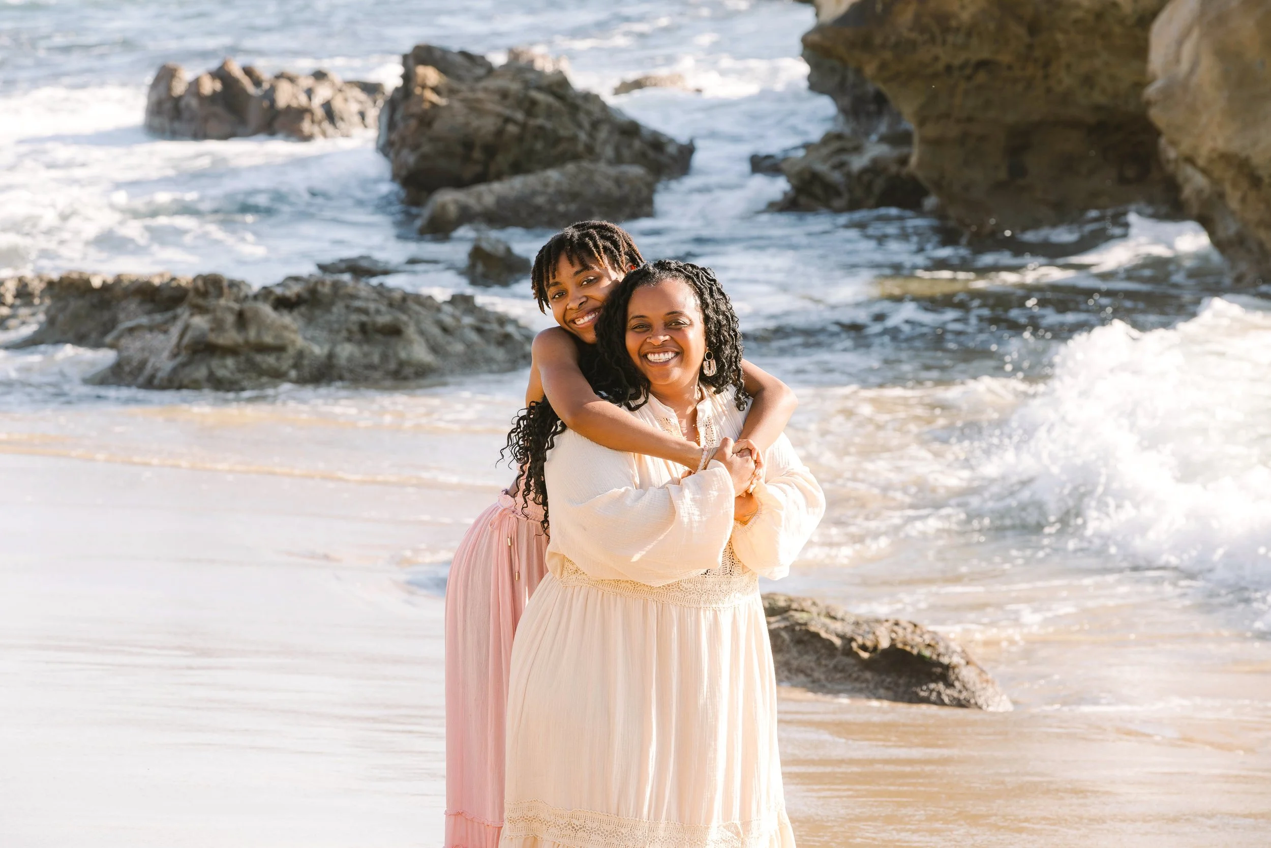 mother-daughter-hugging-laughing-beach-session-laguna.jpg.jpg