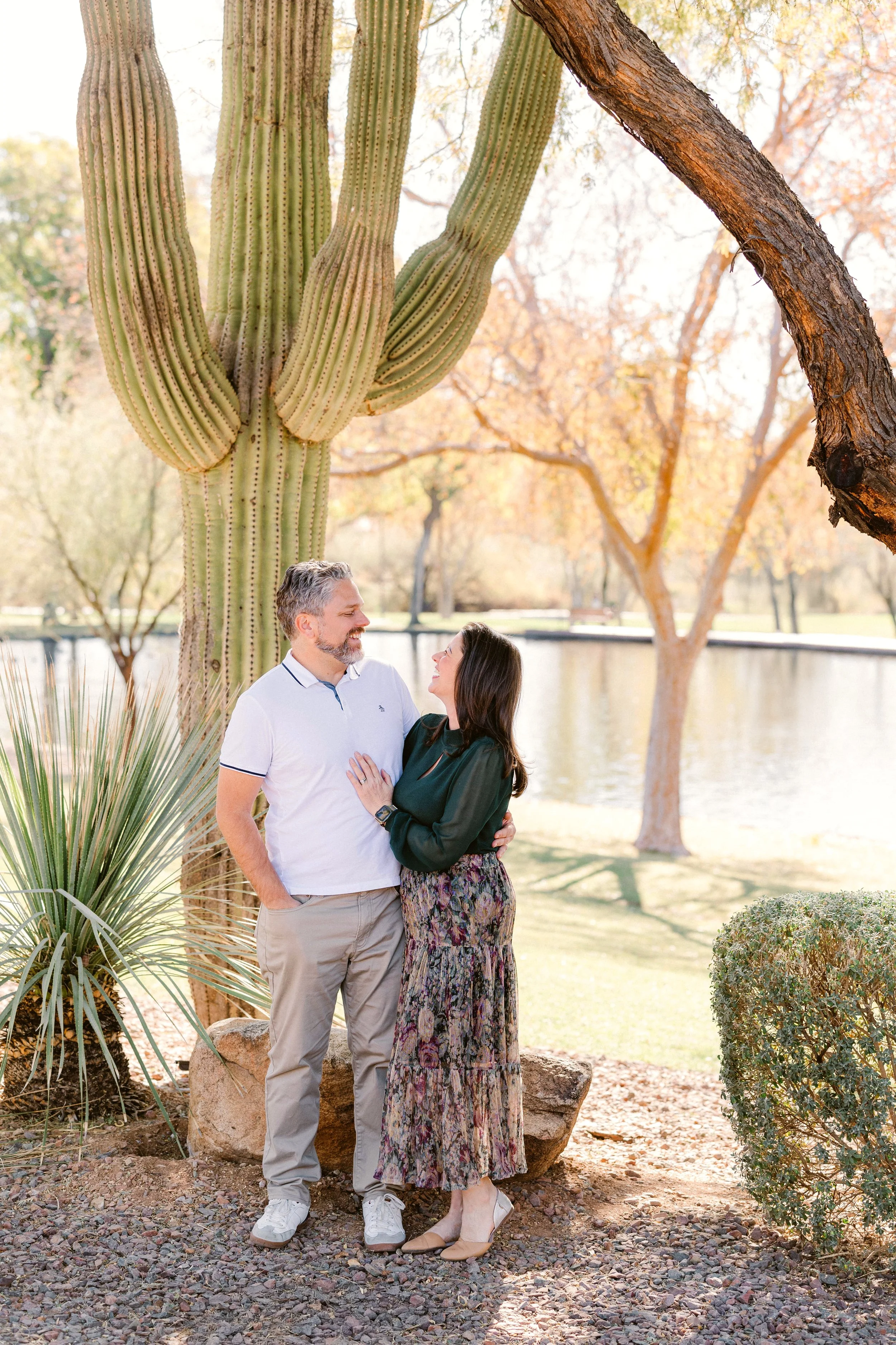 anthem-arizona-family-session-parents-laugh-playfully.jpg