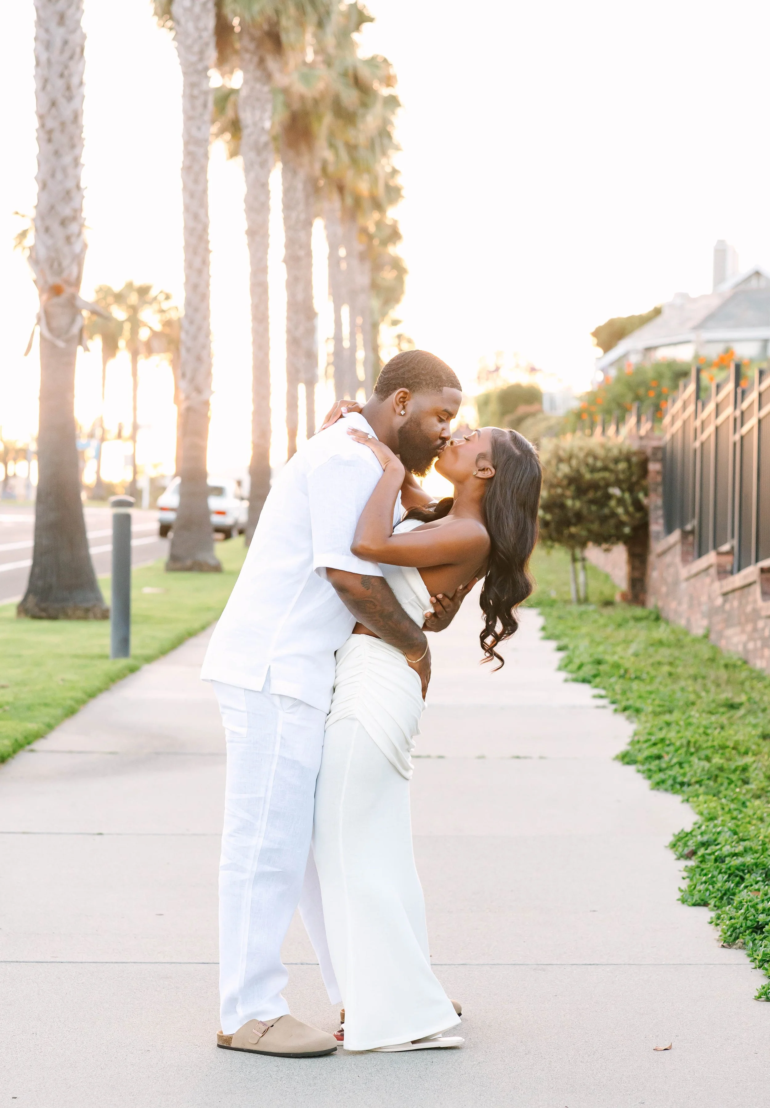 Dana Point engagement session couple kiss.jpg