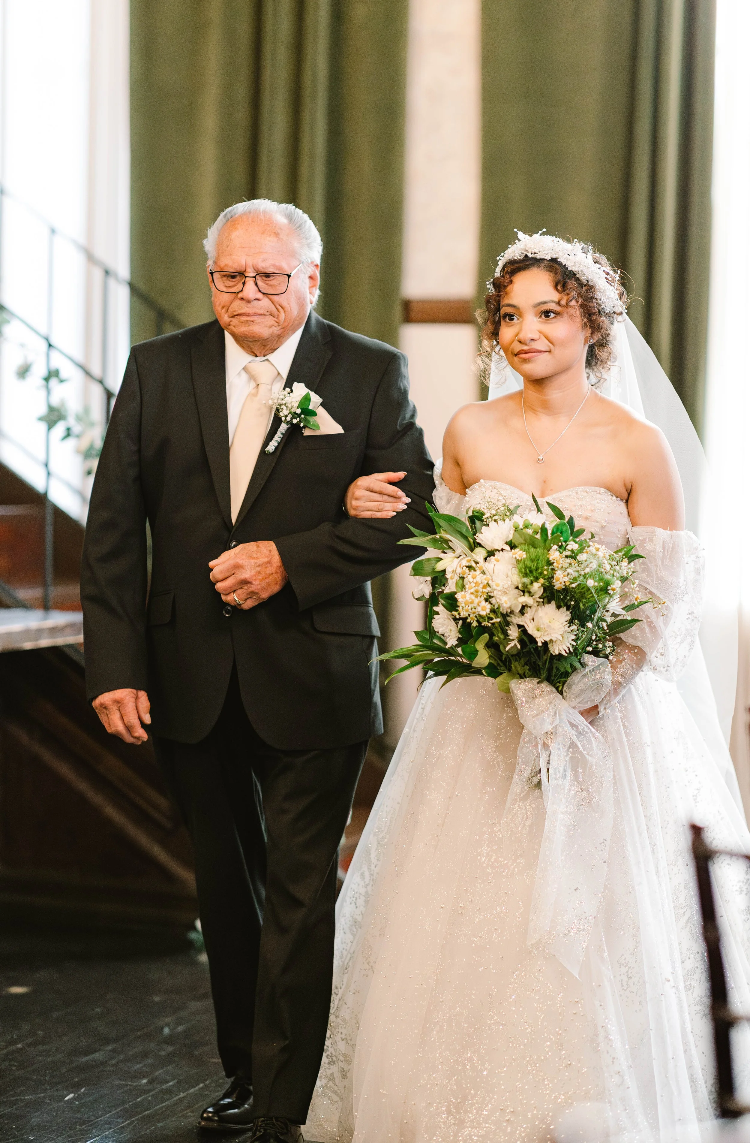 loft-84-riverside-wedding-ceremony-bride-walks-down-aisle-with-grandfather.jpg