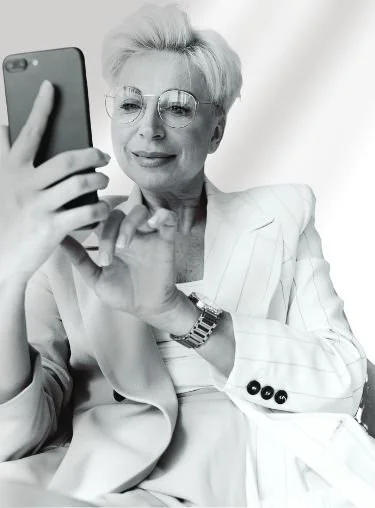 Professional woman in Boston reviewing notes on her phone