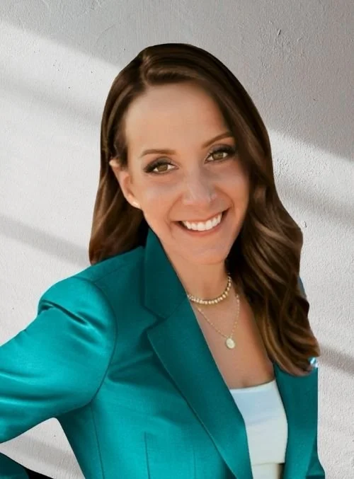 Alexis Verbin, LCSW, LICSW, therapist and owner of Wellcore Healing, wearing a sleeveless purple top against a light background.