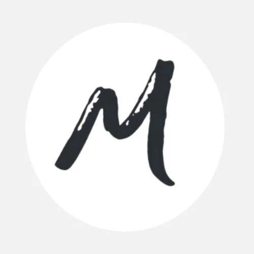 The letter M for Monarch, by Simple Practice, directory logo linking to Alexis Verbin, LCSW, LICSW at Wellcore Healing’s therapist profile for Massachusetts, New York, Colorado, Vermont, and Florida.